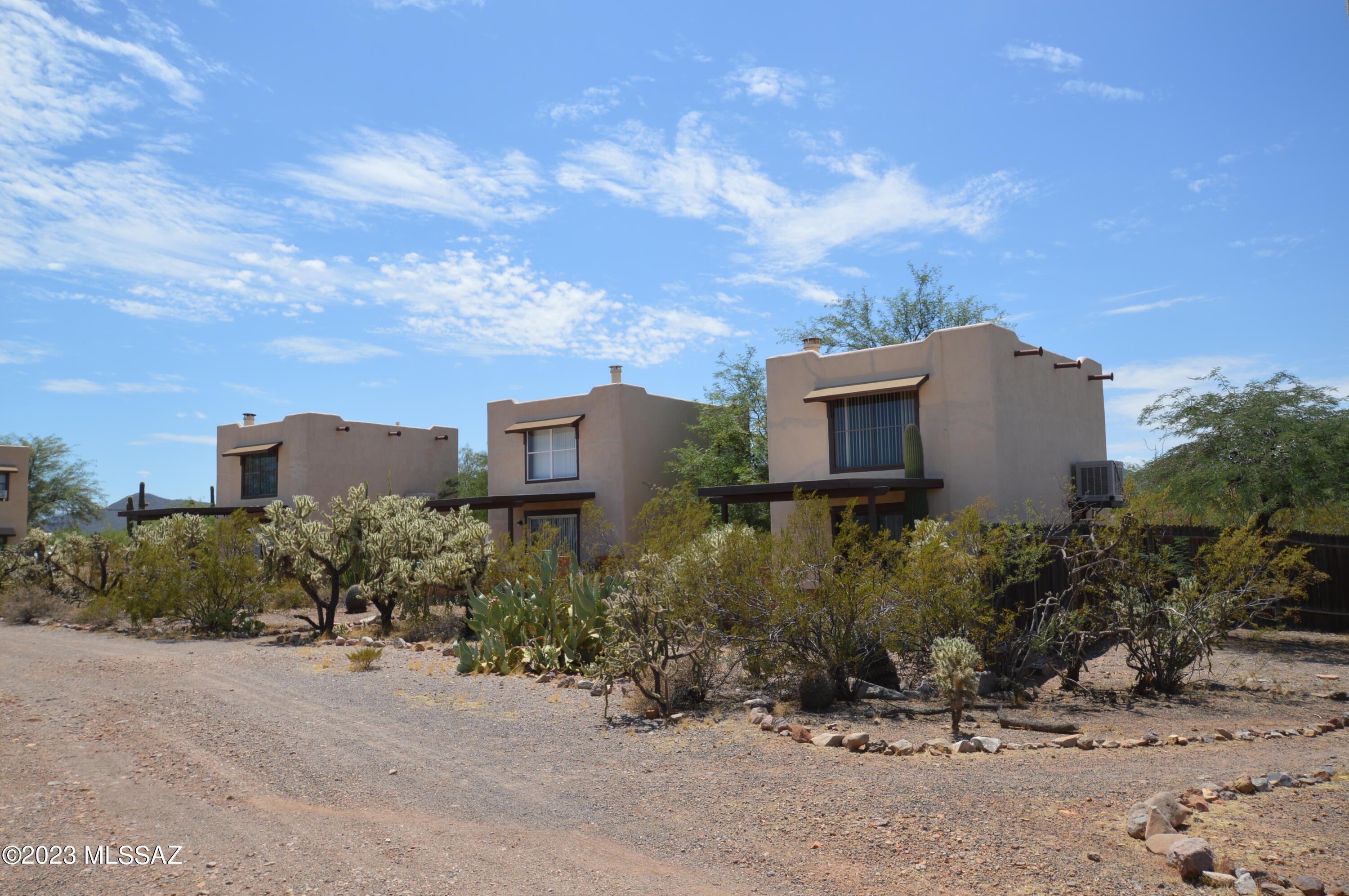 Enchanting location overlooking the Tucson valley. Detached casita with loft bedroom. Open and airy, bright and cheerful. Fully equipped kitchen. Large open living room. Gorgeous walled patio perfect for entertaining. This is out in the country, away from the city noise and hustle and bustle. Come join us!