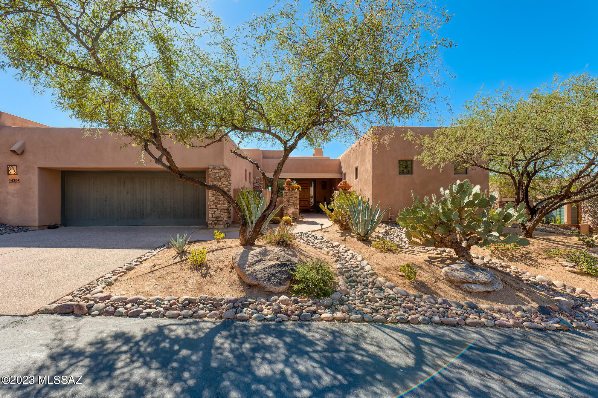 Fully furnished Gallery Cottage w/ mountain & city light views. Largest home in the community on over ½ acre. Fabulous floorplan w/ 2 master suites plus adjoining casita. Italian porcelain tile flooring throughout & new HVAC 2023. The Great room features stacked stone fireplace, wood paneled ceiling & floor to ceiling windows. Kitchen offers granite counters, prep island, Alder Wood cabinetry & stainless appliances. Each master suite includes a sitting area w/ tall glass sliding doors leading to the multiple terraces. The adjacent baths have luxurious travertine counters & tile surrounds for tub and shower. Outdoors you'll enjoy Flagstone patio with 2-sided fireplace, outdoor kitchen & unique custom landscape. Only a few minutes' walk to The Gallery golf courses, clubhouse & restaurant.