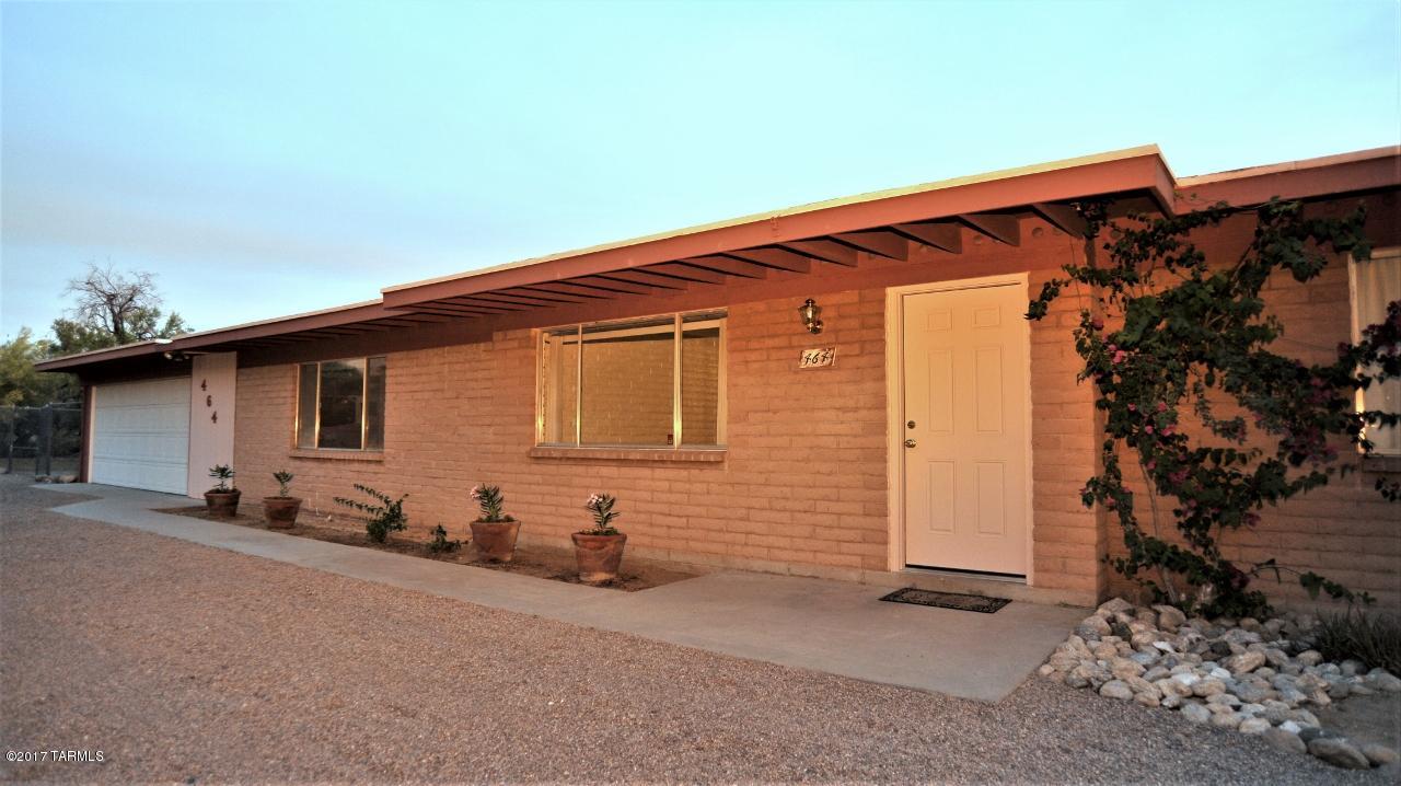 Plenty of room for the whole family in this 4 bedroom main house with attached Guest Quarters including kitchenette and private entrance. Three brand new zoned AC's and brand new water heater! Amazing views of both the city lights and Pusch Ridge! Enjoy the open feeling of the living areas from the Stainless Steel kitchen to the dining area and formal living area. Large Family room for the kids too! Relax on the back porch with fabulous views and plenty of cover. Room to park RV's in the fenced in areas! Extra large 2 car garage with plenty of storage. Freshly painted and ready for you!