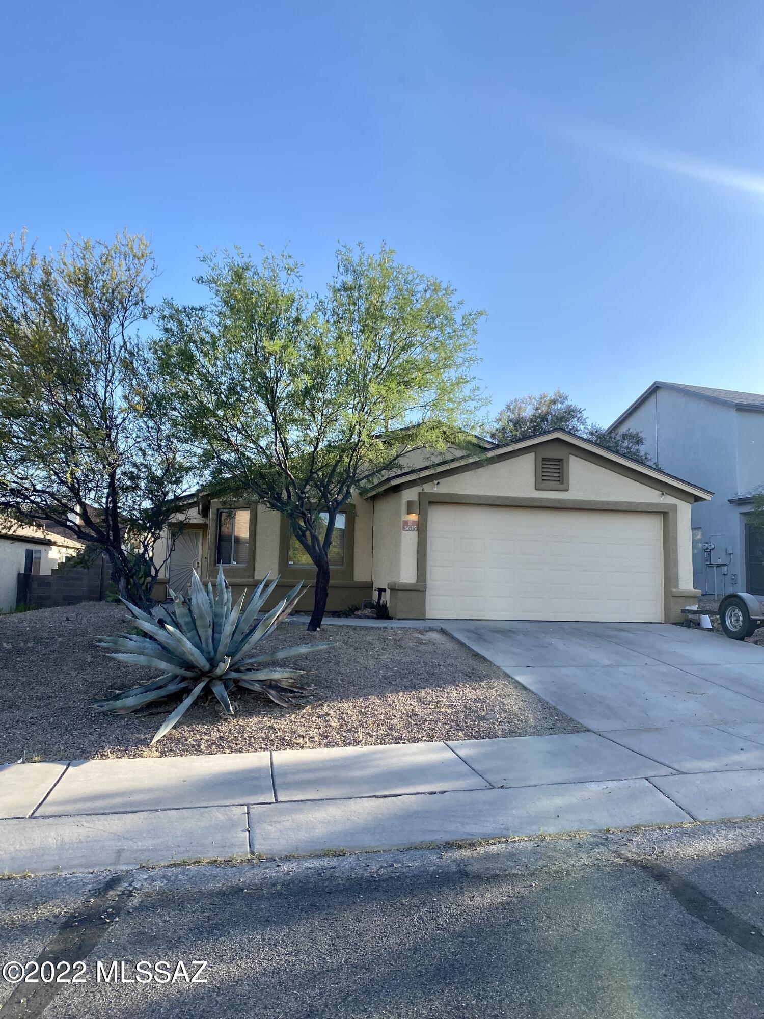Newly reshingled roof and solar panels installed 2021. Charming 4bedroom, 2 bathrooms, 1,538 sq ft of living space, carpet and tile throughout, covered patio, with 2 car garage. Home warranty provided by 2-10 home warranty.  Washer and dryer included *as-is*
