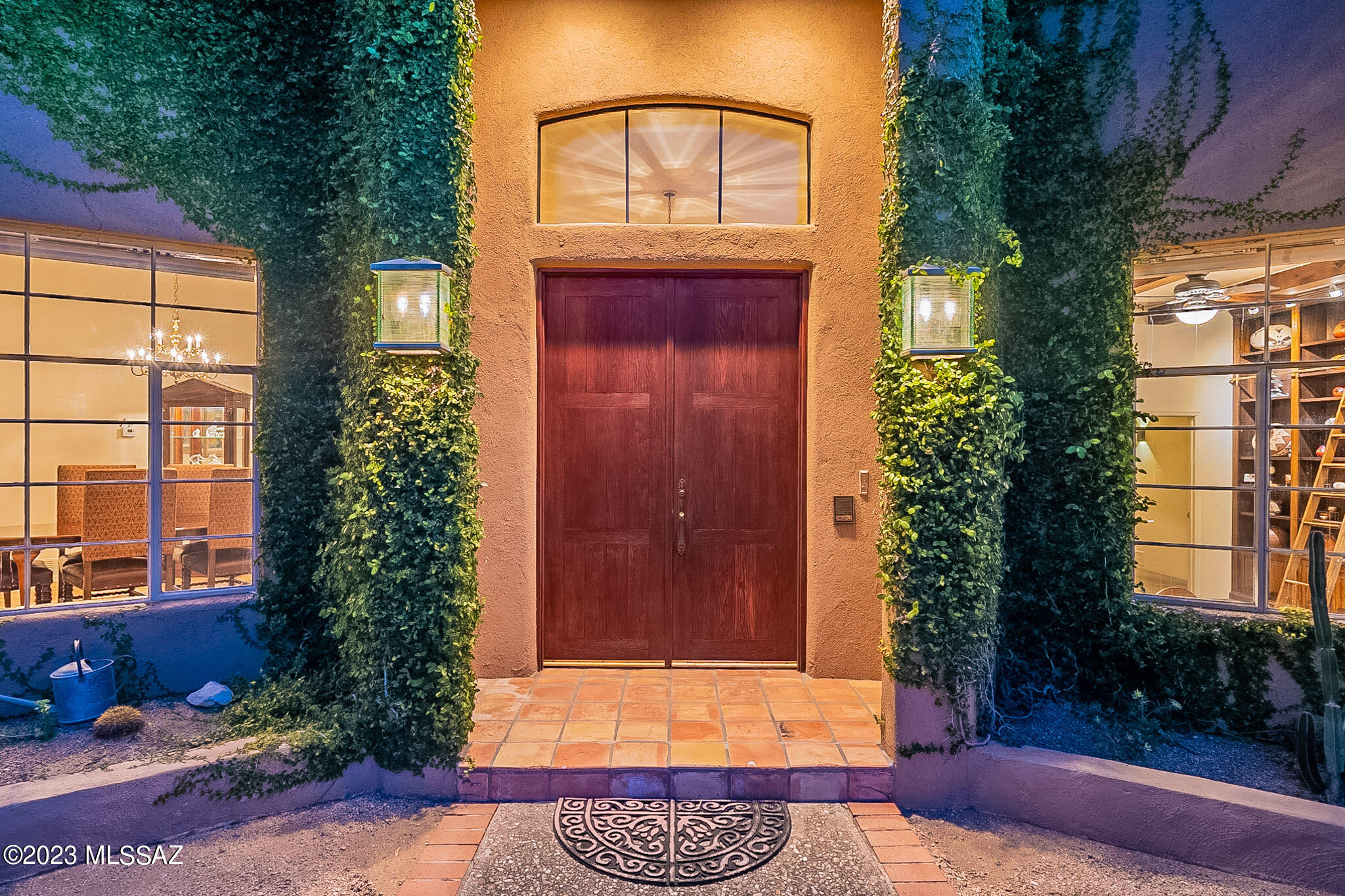 CLASSIC 4BR & 4BA w/DEN RESIDENCE PERCHED HIGH ABOVE THE CITY IN THE GUARD GATED COMMUNITY OF COBBLESTONE. IDEALLY LOCATED AT THE TOP OF CAMPBELL AVE, THIS STUNNING MASONRY BUILT HOME OFFERS A COURTYARD ENTRY,LIVING ROOM FEATURING KOA WOOD FLOORS, FIREPLACE, & WET BAR, ALL OVERLOOKING THE TUCSON VALLEY. A SPACIOUS KITCHEN OFFERS  ''QUEEN VICTORIA'' BRAZILIAN GRANITE COUNTERS, THINK GLASS ISLAND, STAINLESS WOLF & SUB ZERO APPLIANCES, & BREAKFAST NOOK W/ GAS FIREPLACE. A PRIMARY BEDROOM W/SEPARATE SITTING AREA OVERLOOKING THE CITY INCLUDES UPDATED BATH W/ SOAKING TUB, WALK IN SHOWER, THE ''COVETED'' MALE URINAL, & A PRIVATE PATIO W/HOT TUB. LUSH OUTDOOR LIVING SPACE W/COVERED PATIO, KITCHEN, SPARKLING POOL W/ FOUNTAIN, TENNIS COURT, GRASS, & PALM TREES ALL W/ PANORAMIC CITY & MOUNTAIN VIEWS!