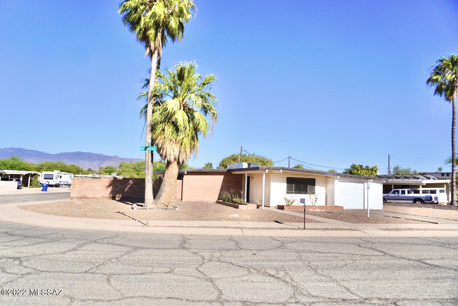 Fantastic Views and Great Eastside location.  Resting on a corner lot and in a cul de sac, is this wonderfully updated 1460 sq. ft home. The kitchen features an island with Butcher block,  granite countertops, SS appliances, gas range and modern white cabinet's.  Spacious (bonus) room that could potentially turn a 3 bedroom into 4.  Good sized back yard with storage shed and extra covered carport. Quiet neighborhood and NO HOA! This wont last long, come take a view!