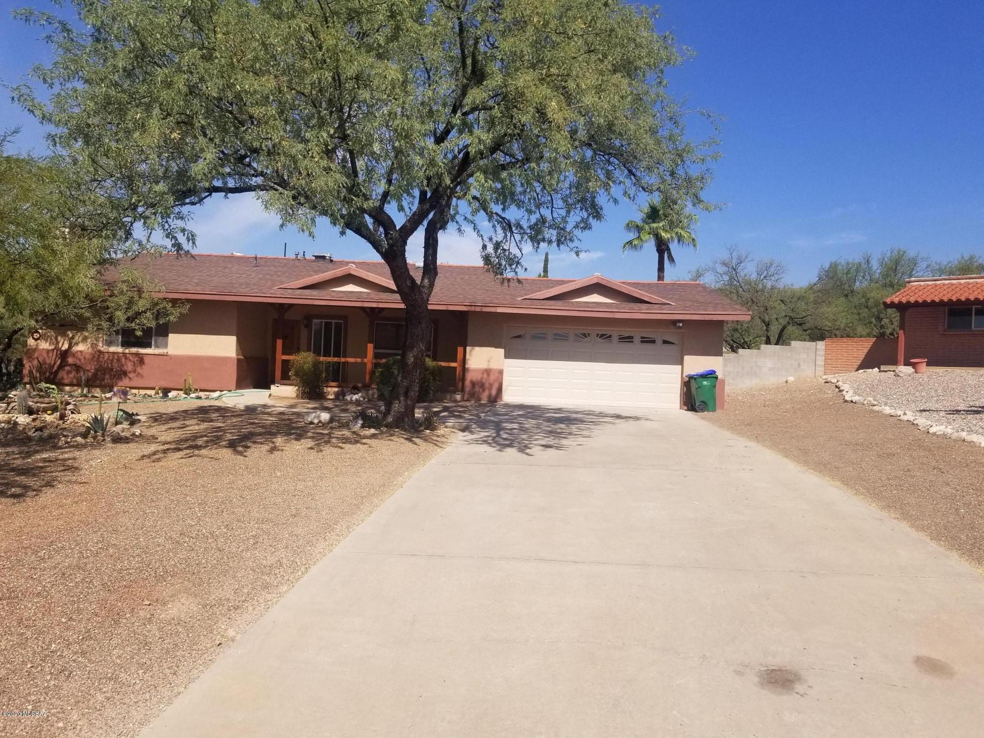 RARE FIND! Located in highly desireable Sabino Vista. A MUST SEE! Vacant and move-in ready. This home has been remodeled and is a pleasure to show. Sited on a lot that is almost a 1/2 acre. New Stainless kitchen appliances (Stove, Micro-wave, and Dishwasher) with granite counter-tops. The 1/2 bath with door to pool deck works as a changing room etc., for the pool. Has separate laundry-room/storage rm. The rear yard is awesome and huge, has outside ramada with Built-in grill, storage cabinets, and serving bar and has evap cooling. Fantastic set-up for pool parties. Super serene and totally a delight for quiet relaxation . Has separate dog-run and the entire yard is walled in. The front yard has nice long driveway to the house which is set back from the street. OWNER IS RELATED TO AGENT.