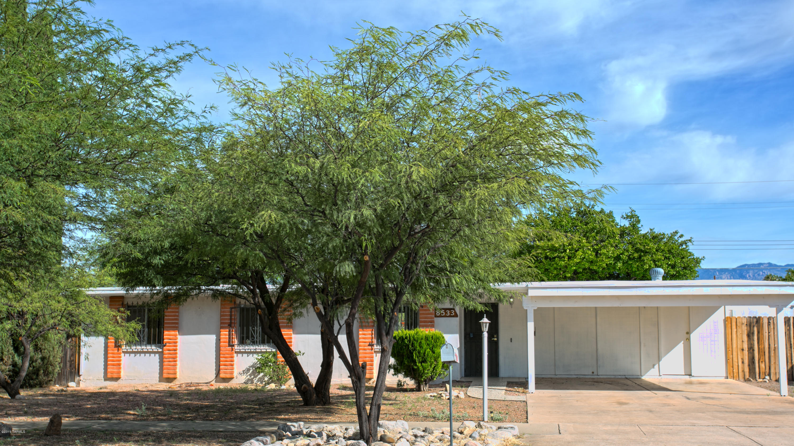 THIS SINGLE FAMILY RESIDENCE WITH 3 BEDROOMS, 2 BATHROOMS, DEN/OFFICE AND 2 CAR CARPORT IS CONVENIENTLY LOCATED ON THE NEAR EASTSIDE.  CERAMIC TILE THROUGHT WITH FRESH PAINT.  ENTERTAIN FAMILY AND FRIENDS AND MOVE EFFORTLESSLY ON THE REAR PATIO WITH PORCH AND SPARKLING POOL.  DON'T MISS THIS OPPORTUNITY !!  EASY ACCESS TO PUBLIC TRANSPORTATION, PARK, SHOPPING AND ENTERTAINMENT.