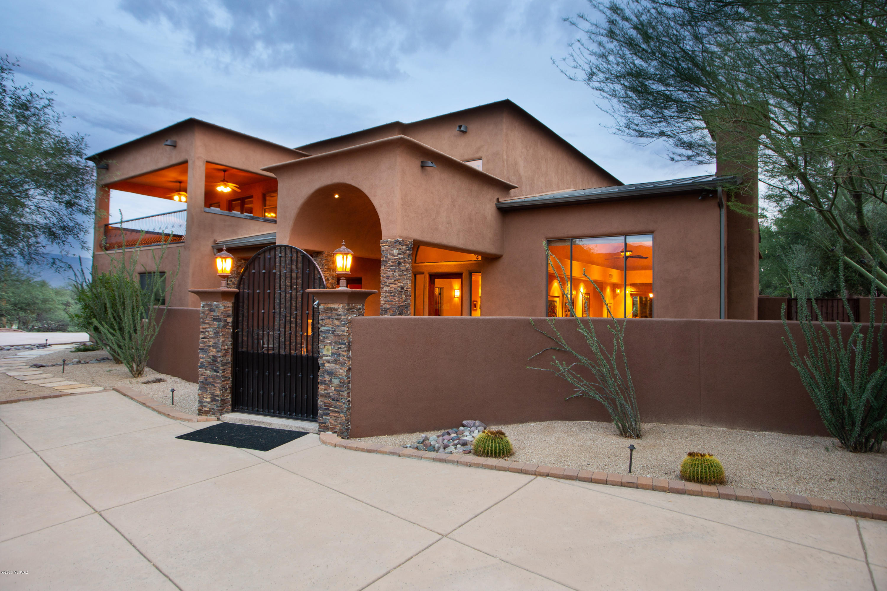 One owner custom home! Two story with a passenger elevator. Wrought iron electric gated front entrance, Terrazzo tile, vaulted entry foyer with custom wood staircase, high ceilings, Venetian plaster, custom ceiling features, zoned High Efficiency ACs, Furnaces & Water Heaters, Soft & filtration water systems, wood floors & more! 5 (could be 6) bedroom with 3 full baths. Master bedroom has ensuite bathroom with double sink, large jacuzzi tub, extra large steam shower, bidet & huge custom dual walk-in California Closet. Gourmet kitchen, Decor gas cook top, double Convection Ovens, 2 Wine Captains, Wet Bar, Granite counter tops, Custom cabinets, & extra large walk-in Pantry with shelves & pull out storage.