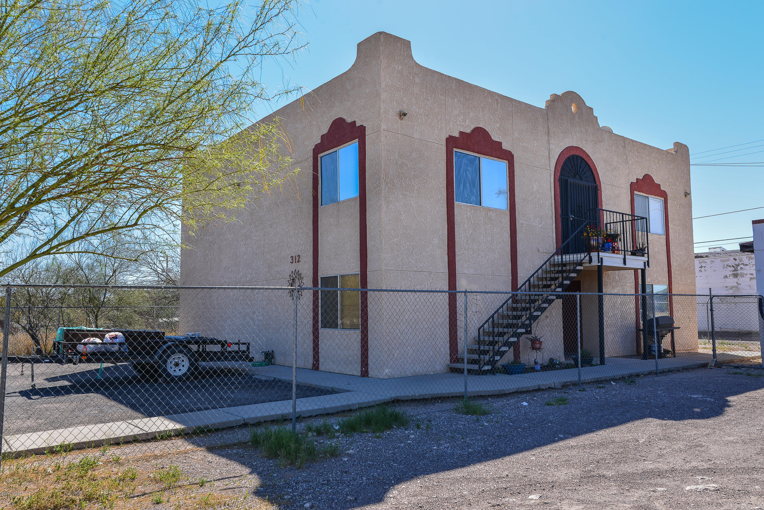 First floor 2 bedroom 1 bath apartment in a unique gated community. Located off of 4th Ave near I-10 and Down Town, surrounded by restaurants like the famous El Nidito and the New first of its kind in Tucson the indoor food court, American Eat Co. & Market. New AC will keep you cool. With fresh paint, this cozy home is ready to move in.