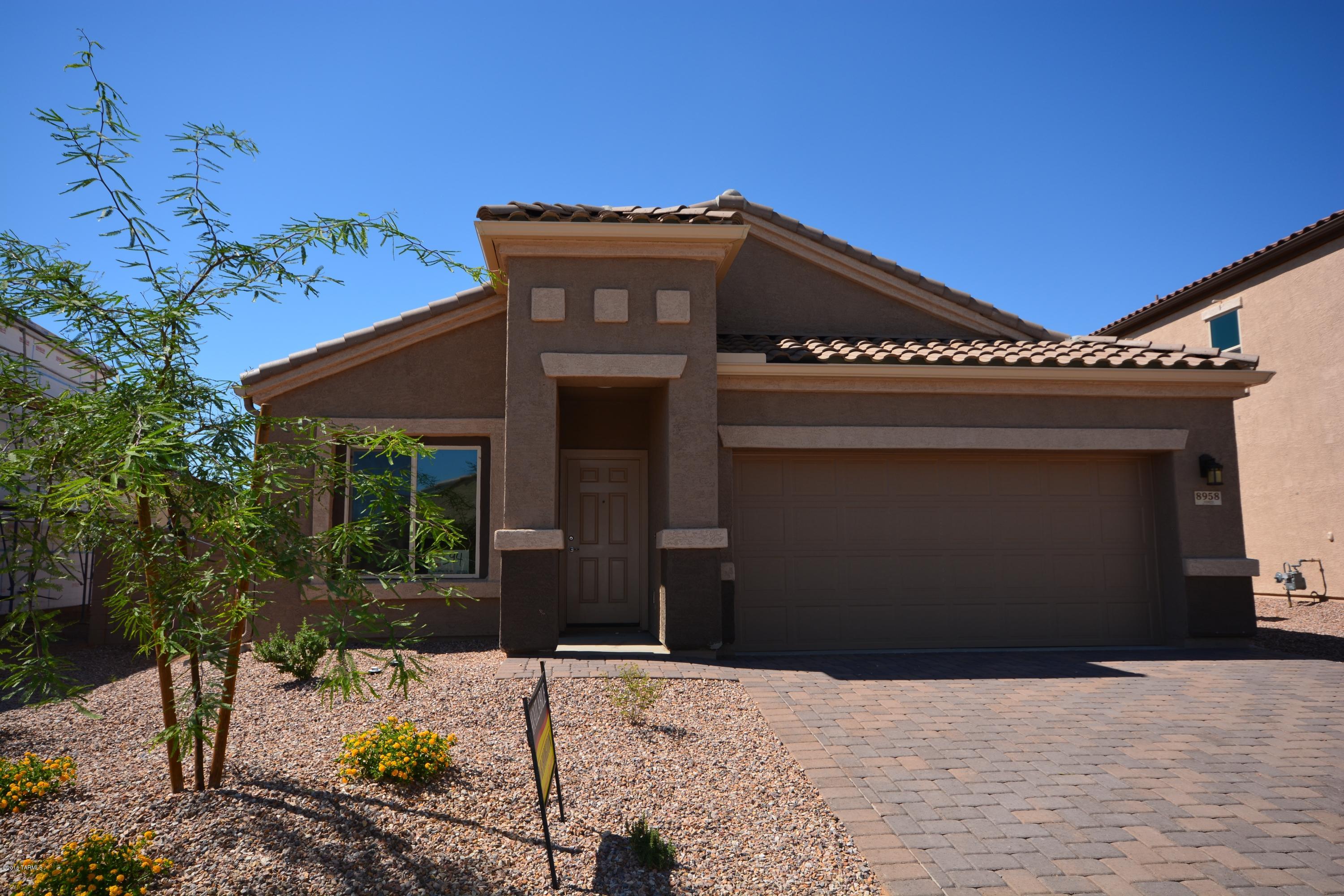 Now open - Saguaro Bloom Phase 2!  This new section has all of our favorite floor plans plus 3 new must see homes!!! We have a wide variety of just released lots with tremendous views and the same amenities and accessibility as Phase 1. This is one of our most popular plans, the  Santa Barbara with 4 bedrooms, 2 1/2 baths and a den.  Open great room off the kitchen with plenty of closets for storage.  Ready Now!!  Brand new construction Energy Star Qualified Home - with a builder warranty.  AMAZING VIEWS of saguaro studded cliffs and amazing sunsets from this perimeter lot.  This one will go quickly