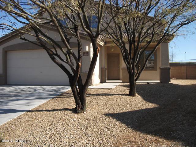 Move in ready is this spacious 4 bedroom office loft plus 3 full baths.  Cathedral ceilings with fans.  Upgraded window coverings.  Formal living & dining.  Large tiled family room off kitchen.  Nice appliances with gas stove.  Lots of cabinets & counter space.  Large covered patio with fruit trees.  Vail school district.