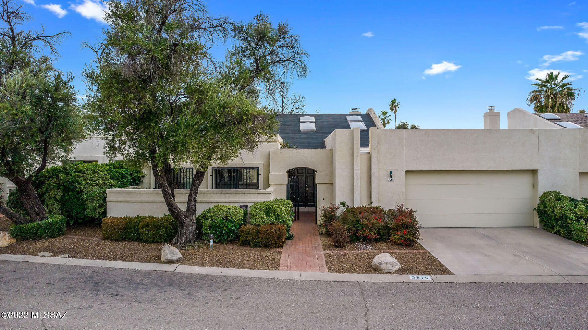 SAM HUGHES
Stunning 3Bedrms / 3 Full Bathrms 2483 sq ft 
2 master bedrooms. Both master bathrooms are done beautifully with Custom  built ins & Heated Floors. Large Open Great Room-Vaulted Ceilings. Large fenced Yard, plus covered patio off Great rm & another off Master bedroom. Bonus storage room off Kitchen.  Beautifully redone  and expanded. Peaceful & Quiet w/14 units on Cul-de-sac. Close to U of A, Shopping, and Banner Hospital.  Lots of storage and closet space. 
 Patio Opens to Fenced Yard.  Nuvo Water softener and cleaner. 
One of a Kind in Sam Hughes.