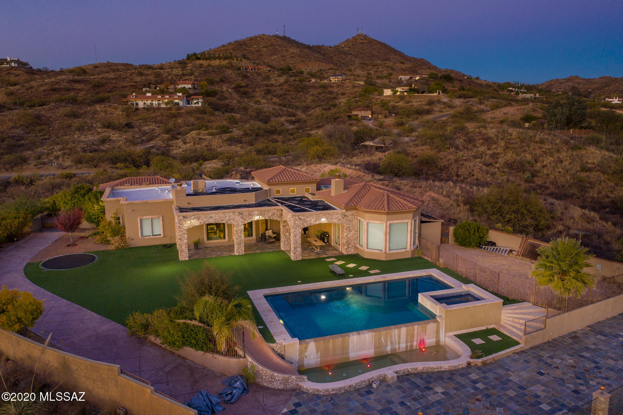 Stunning custom home located on a hilltop at Vista del Cielo. This home offers amazing views and privacy. Open floor plan with direct access to the back patio.