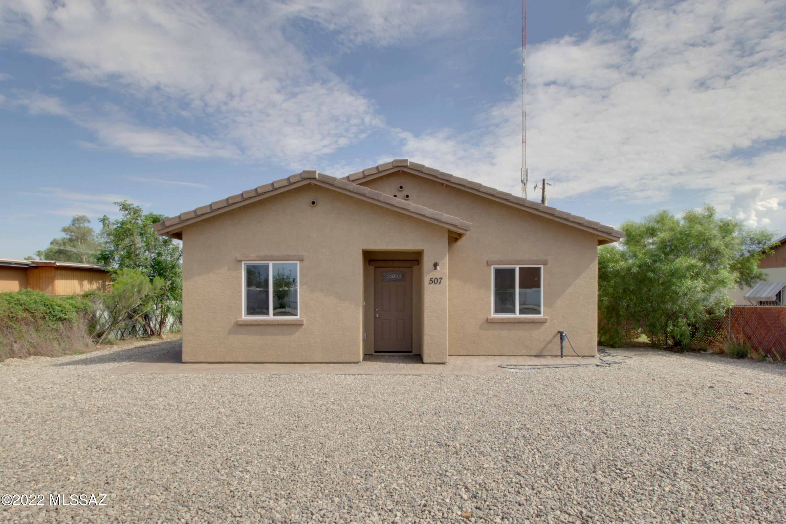 Brand new energy efficient well-crafted home in the perfect central location! Upgrades include 9 ft ceilings, granite countertops, 42'' cabinets, can lighting, concrete tile roof, low-e dual pane windows, ceramic tile floors throughout, 2-toned paint, great room, and a pantry! Brand new appliances, water heater, plumbing, HVAC, roof- and they all come with warranties! Shopping, parks, bus lines, UofA, and restaurants are all close by and there's no HOA! Perfect for a first-time buyer or investor.