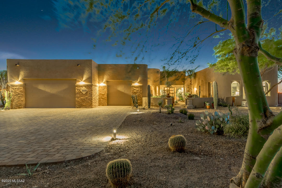 Don't miss your chance to live in this one of a kind desert oasis. This home sits on a huge 3.43 acre lot and has been lovingly cared for and upgraded by the original owners. Perfect for family gatherings and entertaining year round on the covered patio with outdoor kitchen and pizza oven. Summers will be enjoyed by the gorgeous custom pool and winters around the firepit in the meticulously landscaped lower yard. Wolf appliances in the kitchen, motorized window coverings, and travertine master bath are among the numerous luxury features.