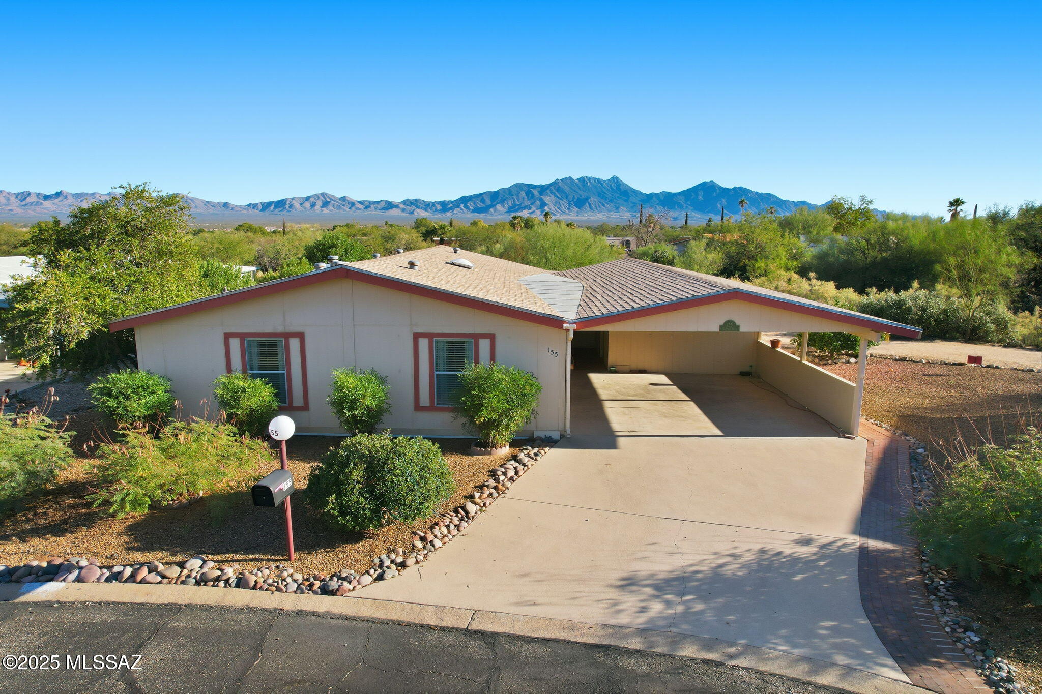 CHARMING 2-BEDROOMS, 2-BATH HOME IN A 55 + COMMUNITY. LOCATED IN POPULAR PUEBLO ESTATES   GREAT ROOM WITH BUILT-IN HUTCH AND DINING AREA, ALSO HAS GLASS SLIDERS THAT OPENS ONTO A WELL-DESIGNED PATIO FOR RELAXING, TAKEN IN THE MOUNTAIN VIEWS, SUNRISES AND SUNSETS. ARIZONA ROOM/ OFFICE HAS WALL A/C UNIT AND A DOOR LEADING OUT TO PATIO AREA. LARGE PRIMARY BEDROOM WITH  2 LIGHTED CLOSETS. LAUNDRY ROOM OFF EFFICENT KITCHEN WITH GAS STOVE. A/C AND GAS HEAT. HOME HAS BEEN REPLUMBED 1/2026. ENJOY THE CONVENENCE OF A SIDE-BY-SIDE CARPORT THAT HAS SEPARATE WORKSHOP/ STORAGE ROOM.  HOA $65.00 MO. INCLUDED GREAT RECREATION FACILITES WITH ACTIVITIES TO EXPLORER. SALT-WATER HEATED POOL AND HOT TUB, TRASH PICK-UP, COMMON AREA AND ROAD MAINTENANCE