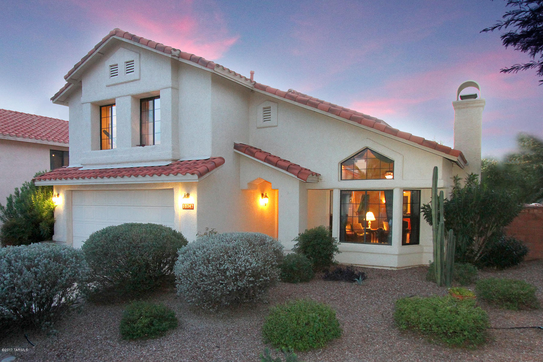 This beautiful 4/5 bedroom, 2.5 baths w/ downstairs home office, is conveniently located in the desirable gated community of The Villages of La Canada. (The downstairs office could be converted into a 5th bedroom.)  Polybutylene was replaced in 2016! The kitchen has been updated w/ Granite, Recessed Lighting, SS Double-Gas Oven/Range by Maytag (Gemini Series), Commercial Grade SS Range Master Vent by Broan-Nutone, SS Bosch Dishwasher, and SS built in Trash Compactor by Kitchen Aid.  Diagonal 18x18 porcelain tile throughout, Double paned tinted windows for energy efficiency and privacy, ...and the list goes on and on. Please see the complete list under document tab in MLS. This home is in the Amphi School district; The River Side Community Park is 5 minutes away. Come see for yourself - it feels like "Home".