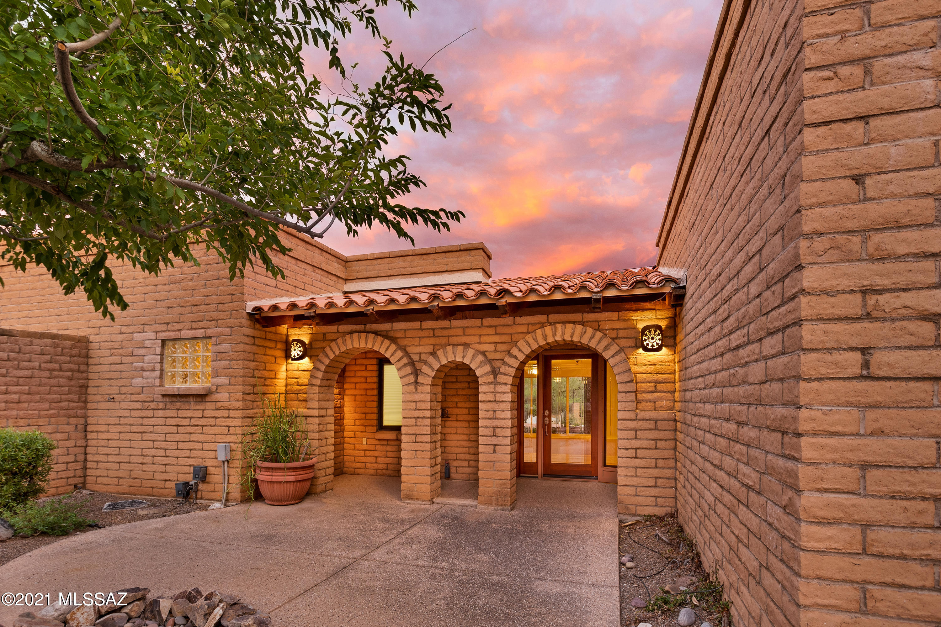 Perched above its expansive desert surroundings, this stunning home offers breathtaking mountain views from the entry through the living areas & owner's suite. Beautiful updates, meticulous maintenance & well-designed, flexible floor plan create a home to engage any lifestyle. With unobstructed views of the Catalinas & Rincons, entertainment spaces flow seamlessly from indoors to out. Set on 1.3 acres, privacy & seclusion create a peaceful setting for swimming, sunning & entertaining. Truly a split floor plan, the owners suite with enormous closet space, romantic bath & fireplace is placed at the north end of the home. Centrally located are the office & two additional bedrooms while a private guest suite resides at the south end. Please see updates list & floor plan under Documents tab.