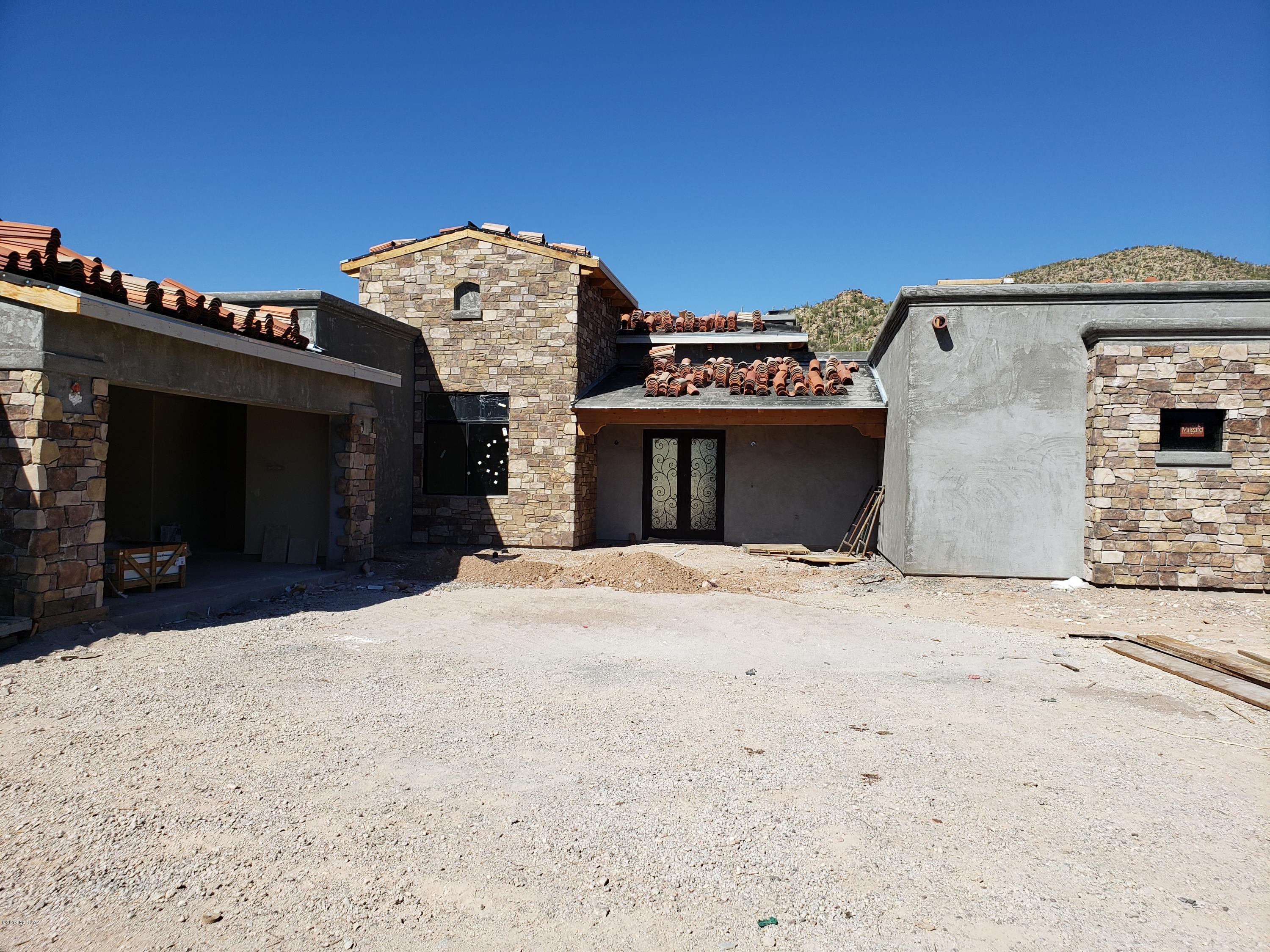 Grand new Sienna 3544 sq ft property now commencing construction in 41 Lot subdivision of Tuscan Estates/Stone Canyon. Open floor plan of Great room, Nook and Kitchen comprise the central elements of this split floor plan. Master bedroom with Integral Flex room, adjacent Den/Office, luxurious bath with double vanities, soaking tub plus a large walk-in closet, is complete with doors to the covered patio and mountain views. Formal Dining, Bedrooms 2 & 3 with in-suite baths, Mountain views, large 3 car garage, patios and driveway with pavers, sold knotty elder doors ad a full premium appliance package are all inclusive.