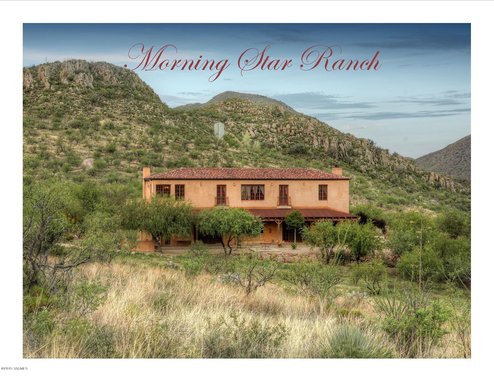 Morning Star Ranch, The Epitome of Luxury Ranch Living! Refined French Country Charm & Timeless Architecture blends seamlessly with touches of Spanish Colonial & antique European finishes which together create a true work of art unrivaled in Southern Arizona! 20in thick rammed earth walls create a rustic yet sophisticated palate which accentuates the imported Turkish stone & distressed teak wood floors. Reclaimed beams, antique doors, custom metal railings, casement windows and a dream epicurean kitchen designed for modern living yet reminiscent of a 300 year old French Farm House. This 36 ac Sanctuary backs to Josephine Canyon & offers views in every direction from the multiple patios & viewing decks. Absolutely Stunning Pool, grounds & 2BR guest house complete this amazing property!