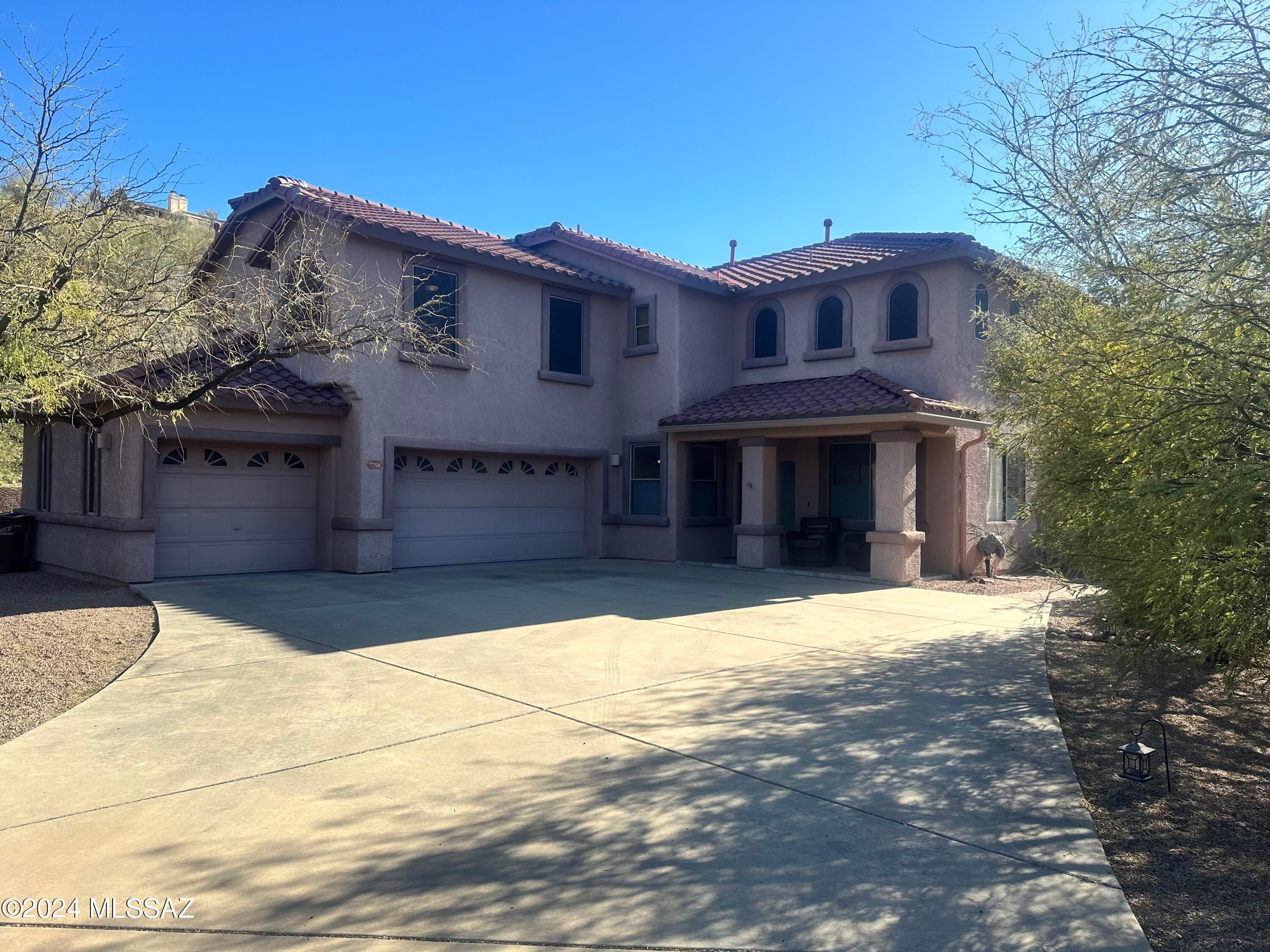 Welcome to your dream house! Just wait until you see this stunning 4bd/3bath, 2998 sqft home located in the exclusive gated Shadows at Sabino community! Secluded private corner lot surrounded by desert landscaping and amazing mountain views. Open entryway welcomes you to the first of many living areas. Gorgeous tile throughout ground floor, with complementing brick fireplace and feature wall. Living room also includes soaring ceilings and SO much natural light! Explore your inner Chef in the spacious custom kitchen that boasts stainless steel appliances, with double oven and gas stove, apron sink, beautiful gray vein quartz counter tops and an abundance of cabinet space plus pantry! Formal dining room in addition to in-kitchen dining. Office/bonus room and guest bathroom downstairs. Take the open staircase to a spacious loft with provided couch! Breathtaking mountain views from the many timeless arched windows. Huge primary suite with walk-in closet, deep soaking tub and walk-in shower and HEATED TILE in master bath. All bedrooms upstairs are great sizes! Laundry room with washer and dryer included! Enjoy the privacy of the backyard oasis with refreshing salt water pool and jacuzzi with service included! Covered patio and huge outdoor grill/cooking space! Pet friendly!/text 520-975-0403 to schedule a showing before its gone!