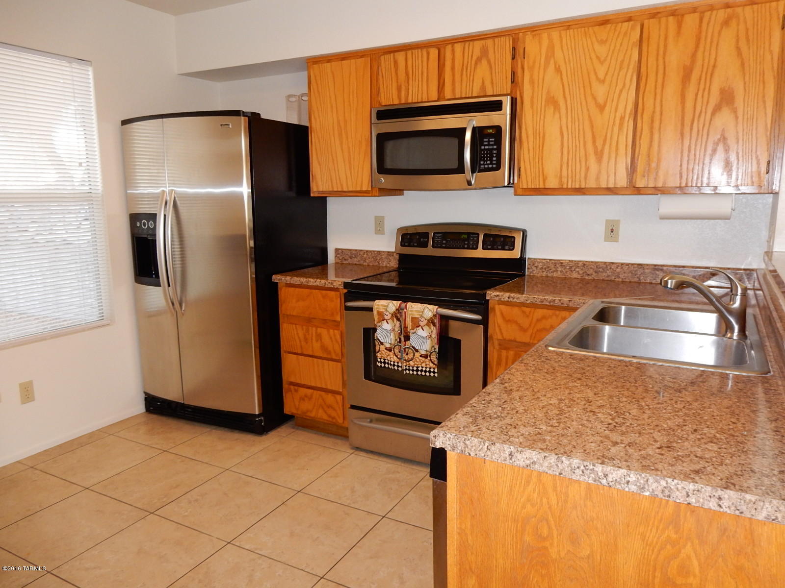 Nice and updated 3 bed, 2.5 bath & 2 car garage home located in convenient Saddlewood Heights a great Westside neighborhood near downtown, I-10, Pima Community College, hospital, and much more! Features A/C, beautiful tile flooring in all the right places, & low maintenance backyard with covered patio great for entertaining. Pets allowed.