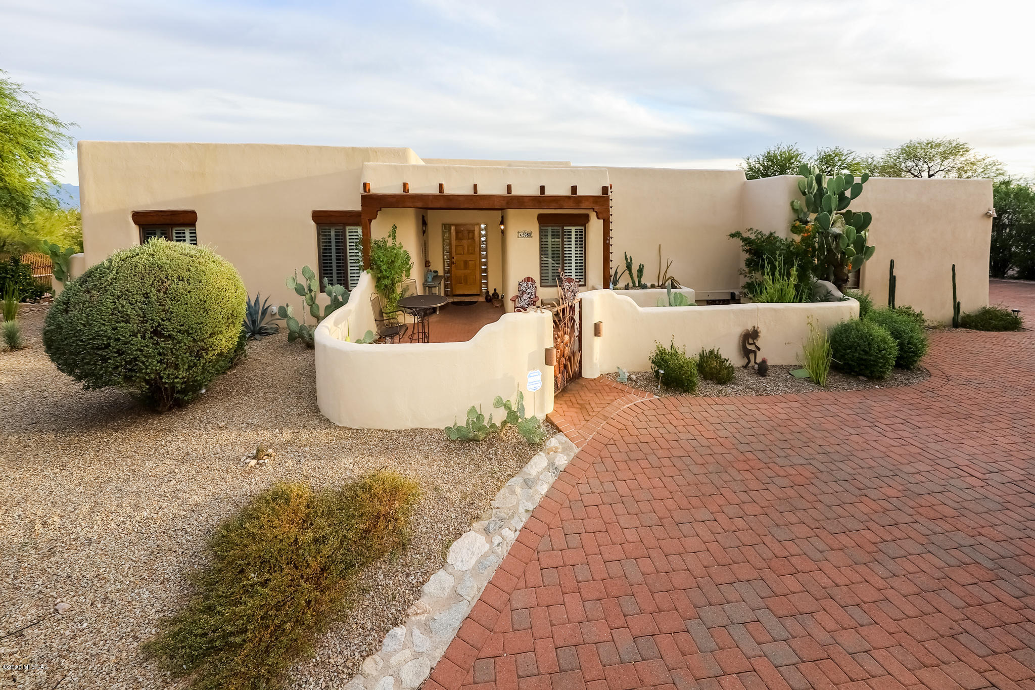 Absolutely spectacular Foothills home. Offering 3,120 SF, 4 Bed, 3 Bath, heated pool & spa with separate controls. Enjoy breathtaking views of city lights from the back patio and amazing mountain views from front courtyard. Gorgeous low-care, professional landscaping front and back. Chef's kitchen features granite countertops, high-end appliances, and wet bar/prep area. Home has new interior paint, beautifully updated master bath, and wood and tile flooring throughout. Smart features include: thermostats, pool & spa controls, lighting, cameras, and more. The feeling of class and luxury will greet you as soon as you enter. This home will not disappoint! Beautiful. Specious. Comfortable. Pride of ownership really shows. This one is a must-see! Come see your new home today.