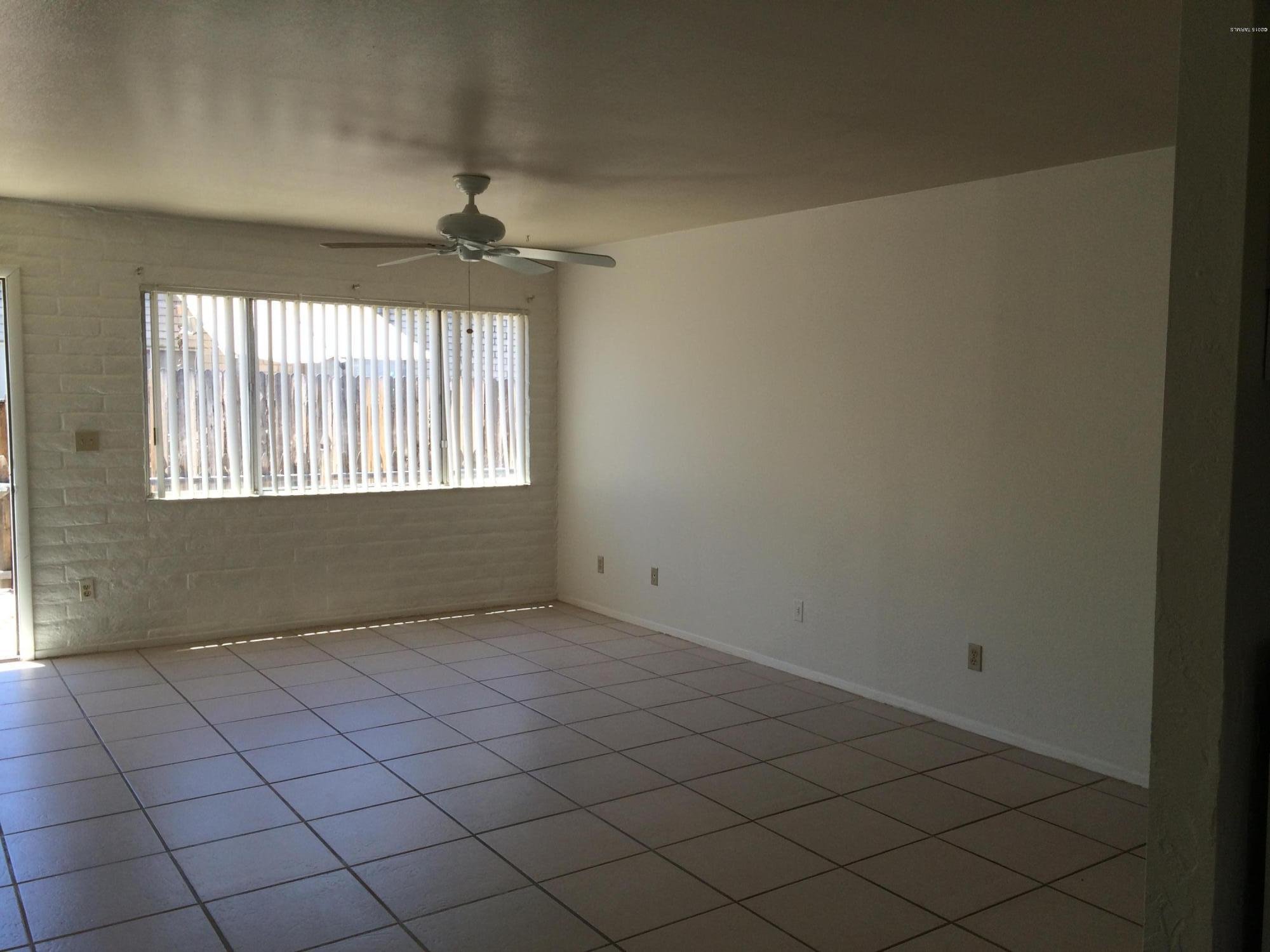 One bedroom, one bath, end unit with 3' picket fence, stack washer/dryer, ceramic tile thruout, single covered parking space, small storage area. Close to bus lines and shopping.