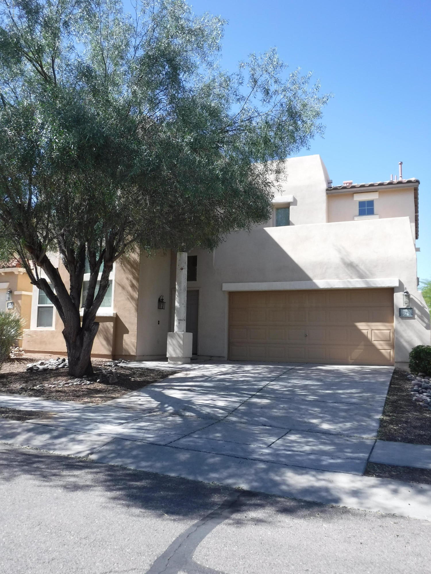 Fantastic Pulte Valencia floorplan features 3 bd, 3ba, den with Vaulted ceilings that highlight the great room entrance. Downstairs den easy to convert to 4th bedroom. Gas Stove, Refrigerator, Dishwasher, Washer & Dryer included. Low care landscaping, covered patio and neighborhood park nearby! A little TLC is all this one needs for you to call it your new HAPPY HOME!