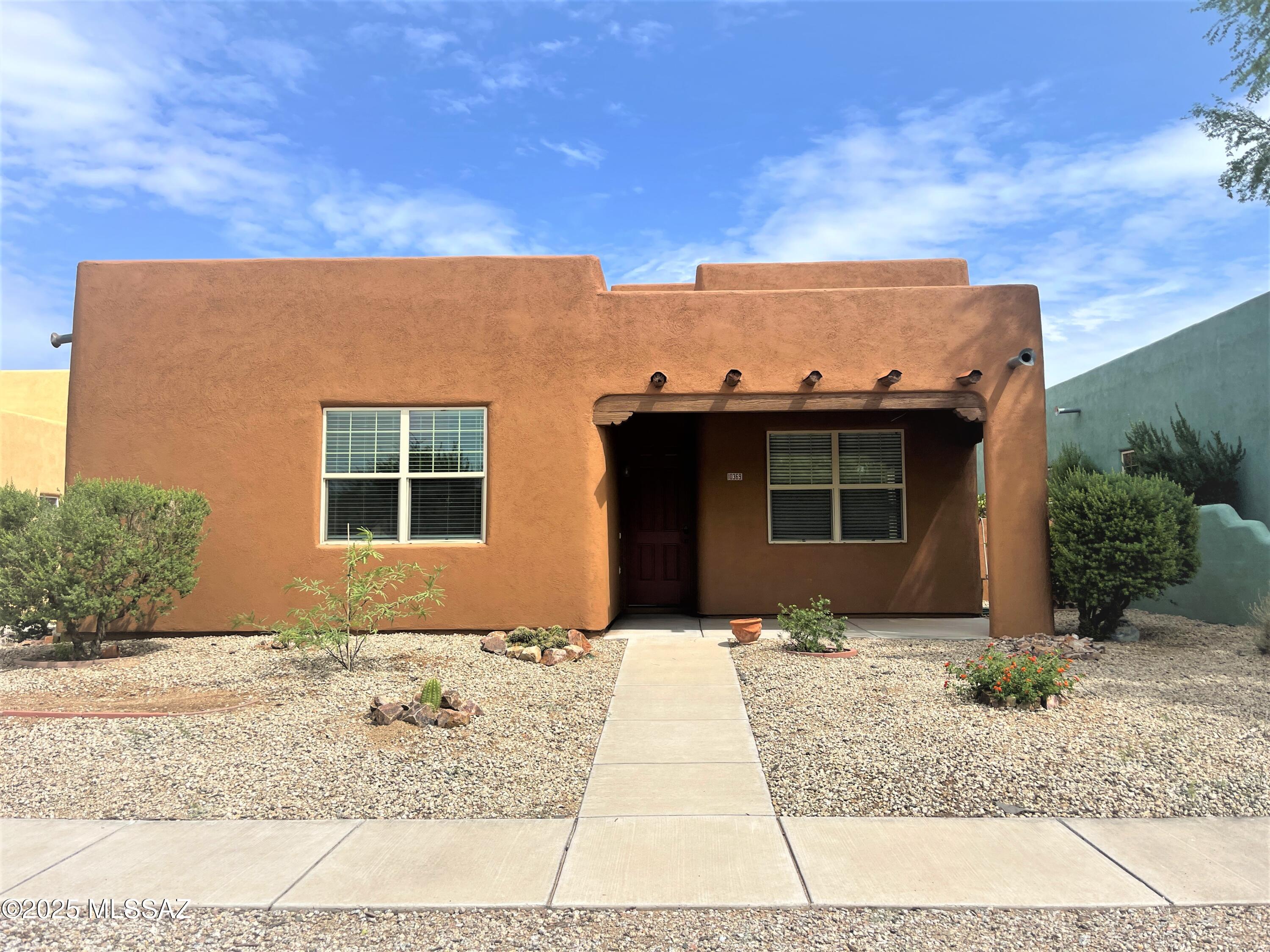 No Application Fees! Charming 3 bedroom, 2 bathroom single-level Tucson home located in the desirable Civano community. This home offers an open floor plan with 10' ceilings, tile flooring throughout with no carpeting, two tone neutral paint, and ceiling fans in each room. The large living room features a wood beam ceiling, and a separate family room provides additional living space.  The kitchen includes extended counter space, a breakfast bar, upgraded cabinets, an electric range, built-in microwave, dishwasher, and refrigerator. The spacious primary suite features a walk-in closet and a private bath with a larger soaking tub. A washing machine and dryer are included, and the two-car garage provides ample parking and storage. The backyard is perfect for outdoor enjoyment with a covered patio, easy-to-maintain desert landscaping, fruit trees, grapevines, and a garden area. Community amenities include a refreshing pool, children's playgrounds, and multiple greenbelt areas.  Located in the highly sought-after Civano neighborhood, known for its greenbelts, community activities, and walkable design. Just minutes from I-10, Davis-Monthan Air Force Base, and shopping and dining at Houghton Town Center. Residents also enjoy access to nearby parks, biking trails, and the Vail School District.

All Denali Real Estate residents are automatically enrolled in the Resident Benefits Package (RBP) for $55.00/month which includes Renter's Liability Insurance, Credit Building to help boost the resident's credit scores with timely rent payments, up to $1M Identity Theft Protection, HVAC air filter delivery (for applicable properties), our best-in-class resident rewards program, and much more!