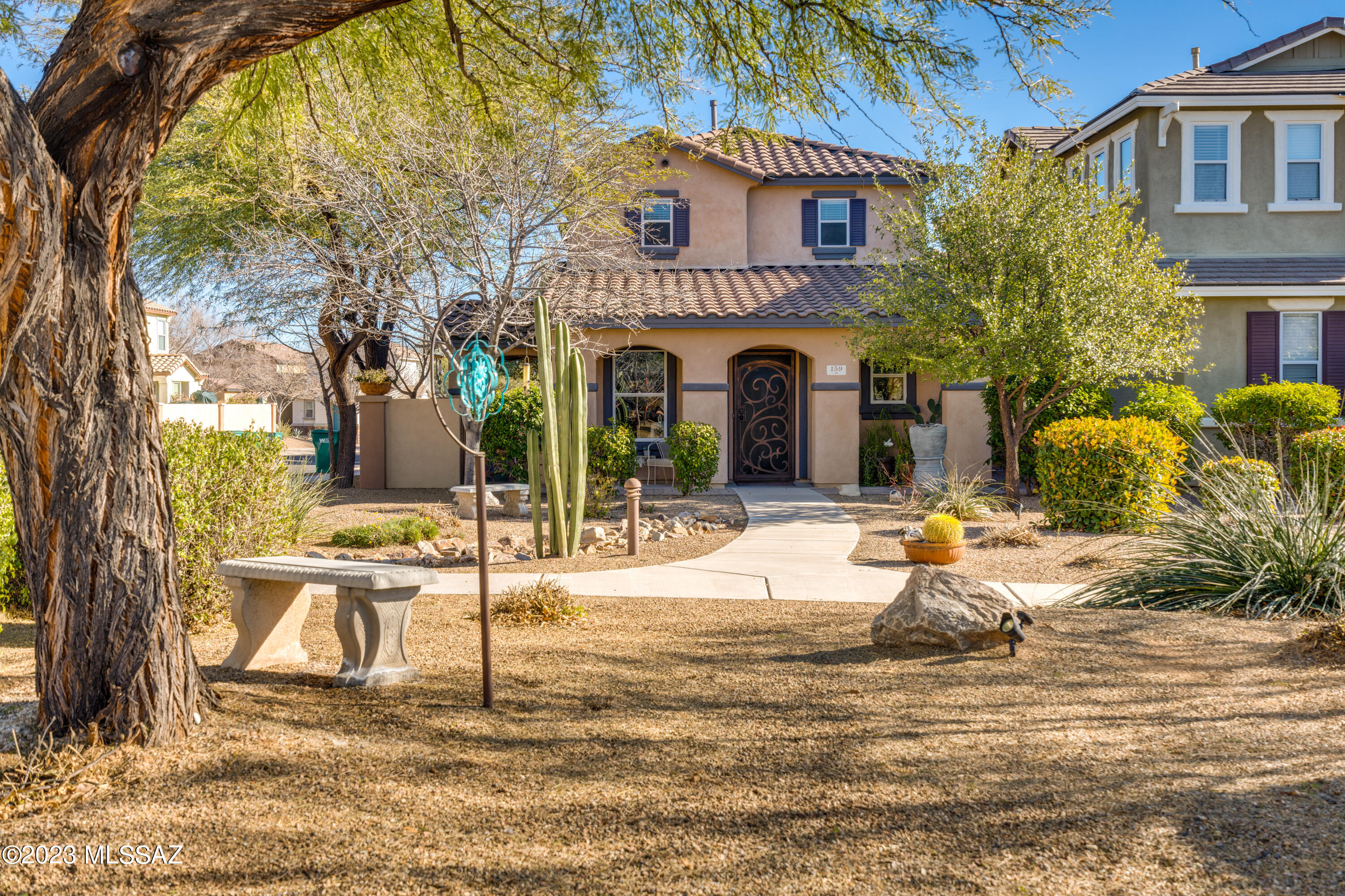 Range Pricing will accept/counter offers $279,900-$289,900. This beautiful  move in ready low maintenance home in Rancho Sahuarita. This home features remodeled bathrooms & laundry, designer carpet upstairs, built in speakers downstairs & patio, farm style window & door trim, media center w/fireplace, garage access door, garage floor coating, custom railing, upstairs solar screens, extended front patio & rear driveway. The backyard is perfect for entertaining with a fireplace, built in seating & BBQ. Interior painted 2019,  Exterior painted 2021, bath & laundry remodeled 2021, New carpet 2022,  Custom security gate & matching side gate 2022, Roof & HVAC Serviced 2022. * BBQ, W/D, Living room TV, Workbench, garage wall shelving all convey. Owner/Agent The HOA covers all exterior landscaping, maintenance, watering & exterior wall paint for a carefree lifestyle. Enjoy 3 pools, water park, splash pad, gym, classes & tons of activities. Owner/Agent