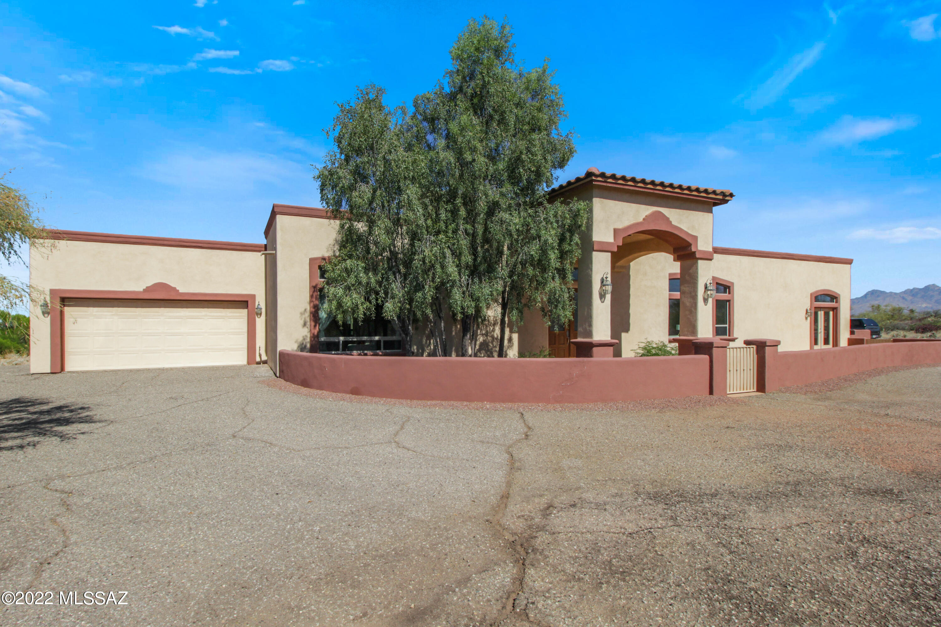 Custom Home built in 2003, and just updated in 2022. This 6114 SF, 4 bedroom, 2 full bath plus 2 half bath home with 4-car garage has so much to offer—like an additional 2 bedroom, 1 bath attached guesthouse with its own laundry room and another 2 car garage! Open concept floor plan showcases amazing kitchen with stainless steel appliances, granite counters and sink, extra long breakfast bar. Fresh custom paint, new carpet, lighting and fan fixtures throughout. Master bedroom is 2-stories with a lower level patio and upper level balcony with sweeping views off of its loft. Pool and spa is located in courtyard of home with max privacy. Multiple private patios around property. Views out of almost every window. This home has so much to offer. Come. See. Stay!