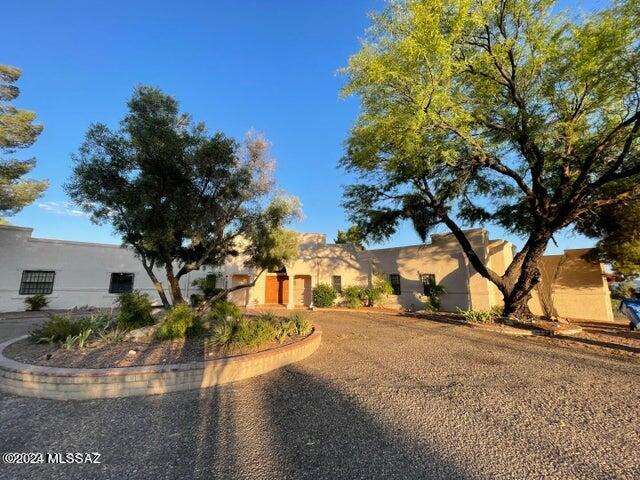 Welcome to this extraordinary hilltop estate, nestled on over 4 acres of picturesque land boasting breathtaking panoramic views. Prepare to be captivated by the beauty of nature that surrounds you, as well as endless possibilities this property offers. As you step onto the grounds, you will immediately notice the harmonious blend of natural serenity. The spacious pool area invites you to indulge in moments of relaxation while taking in the stunning vistas that stretch out before you. Adjacent to the pool, an inviting entertainment Ramada provides the perfect space to host gatherings. For the enchanted evenings, a cozy fire pit awaits you, offering a delightful ambiance & the perfect setting.A guest suite is a highlight of this remarkable property.