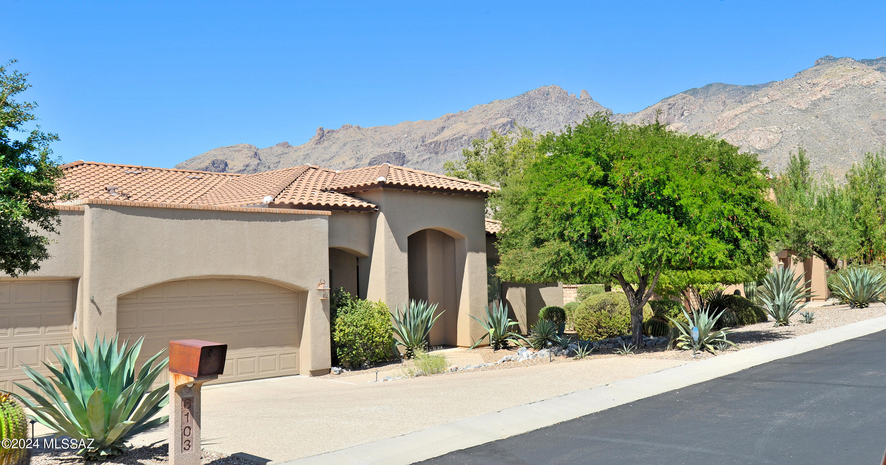 Location, Location, Location. Views, Views, Views.   This gated community is located in the Catalina Foothills near all of the finest amenities.  The home is meticulous.  The open kitchen consists of White cabinetry, newer hardware, quartz style countertops with an undermount sink, raised bar with seating for 4, three newer beautiful pendant lights, a center island and stainless-steel appliances which include:  Newer LG French door refrigerator with water/ice dispenser, Newer LG built in microwave and oven, dishwasher and gas cooktop. The family room is very large with a gas fireplace and mounted TV.  The dining room can be used for many purposes:  a den, office, exercise area, or pool table. The master bedroom is very large with a bay window and a beautiful bathroom.  Dual sinks, make up area, framed mirrors, tiled walls, granite countertops, undermount sinks, soaking tub, walk in shower with glass block, Newer Toto Drake 21 toilet with Toto C5 Washlet  and a large walk in closet.   
The rear yard is incredible with amazing views in all directions.  Enjoy the pool, built in BBQ with natural gas, covered patio with extended travertine flooring, misting system, artificial grass and view fencing.  District 16 award winning schools. Located near world class resorts, hiking trails, golf courses, upscale shopping and restaurants and close to 3 hospitals. 
Additional features include: 
3 car garage with storage cabinets and a newer motor.
Replaced entire roof underlayment (SBS-TU43 upgrade), including raised batten system for better drainage and a newer kitchen skylight, newer electric blinds in living room, kitchen, patio door and master bedroom. Laundry room with upper/lower cabinetry and a laundry sink. Complete refinishing of all travertine flooring.
Newer pool lights and variable speed pool pump. Drained and pressure washed pool and then refilled it. 4 New ring Pro outdoor cameras. Newer digital locks for front door and garage entry door to house. Newer high efficiency water softener system. Newer hot water heater. Over ½ acre lot with no neighbors behind for added privacy. Newer ceiling fans throughout the house and patio. Newer pendant lights overhanging kitchen counter. Newer LED overhead lighting. Newer security system. Newer outdoor path and floodlight lighting system. Installed a new whole house humidifier.
See attached list in MLS for a detailed list of upgrades