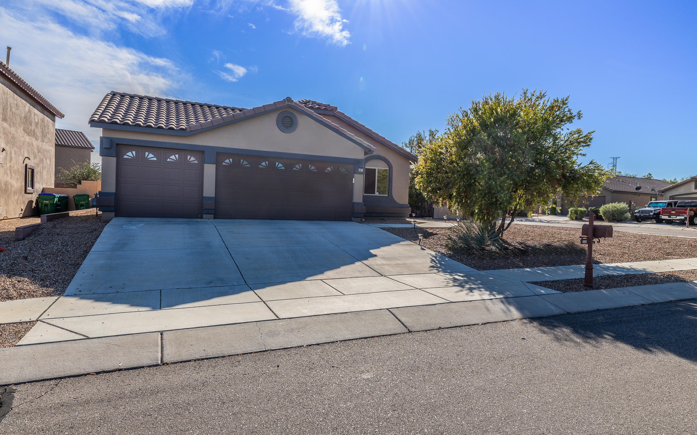 Immaculate 3 bedroom plus a den single story home with vaulted ceilings, split bedroom plan, 3-car garage with 2 ft. extension. Zodiac Quartz countertops in kitchen with island. Inside and outside wired for surround sound. Ceiling fans, large covered patio with extended pad, and spacious backyard on a corner lot. One off-site pool within walking distance across the street. Tremendous community amenities featuring clubhouse, gym, pools, and water park, playgrounds and lake, dog park, and walking trails.