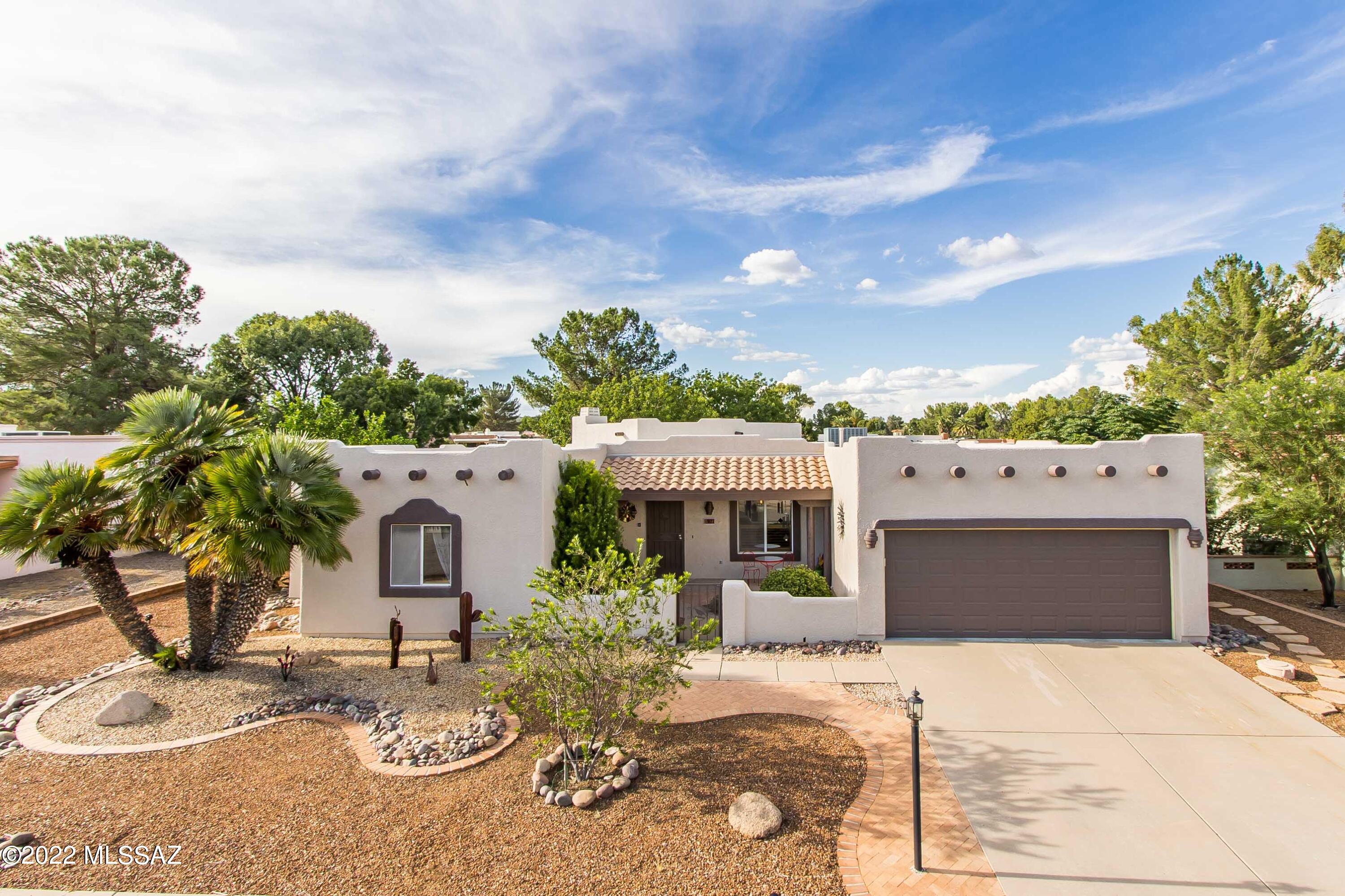 Are you ready for a home in the heart of Green Valley that backs up to a golf course with an ultra low HOA, not part of the GVR, and recently updated?  Look no further...This home is truly a desert diamond.  Recently updated 3 bedroom, 2 1/2 bath home on the 11th hole which is a Par 3.  Interior laundry, spacious, high ceilings in the living room with clerestory windows, gas fireplace, and guest bedroom has an ensuite.  Incredible outdoor patio, tile plank flooring, freshly painted, backyard pavers, epoxy garage floors, the list goes on!  This is what retirement living in an over 55 Community is all about.  One of a kind home built in 1994, one of the newer homes in this development.