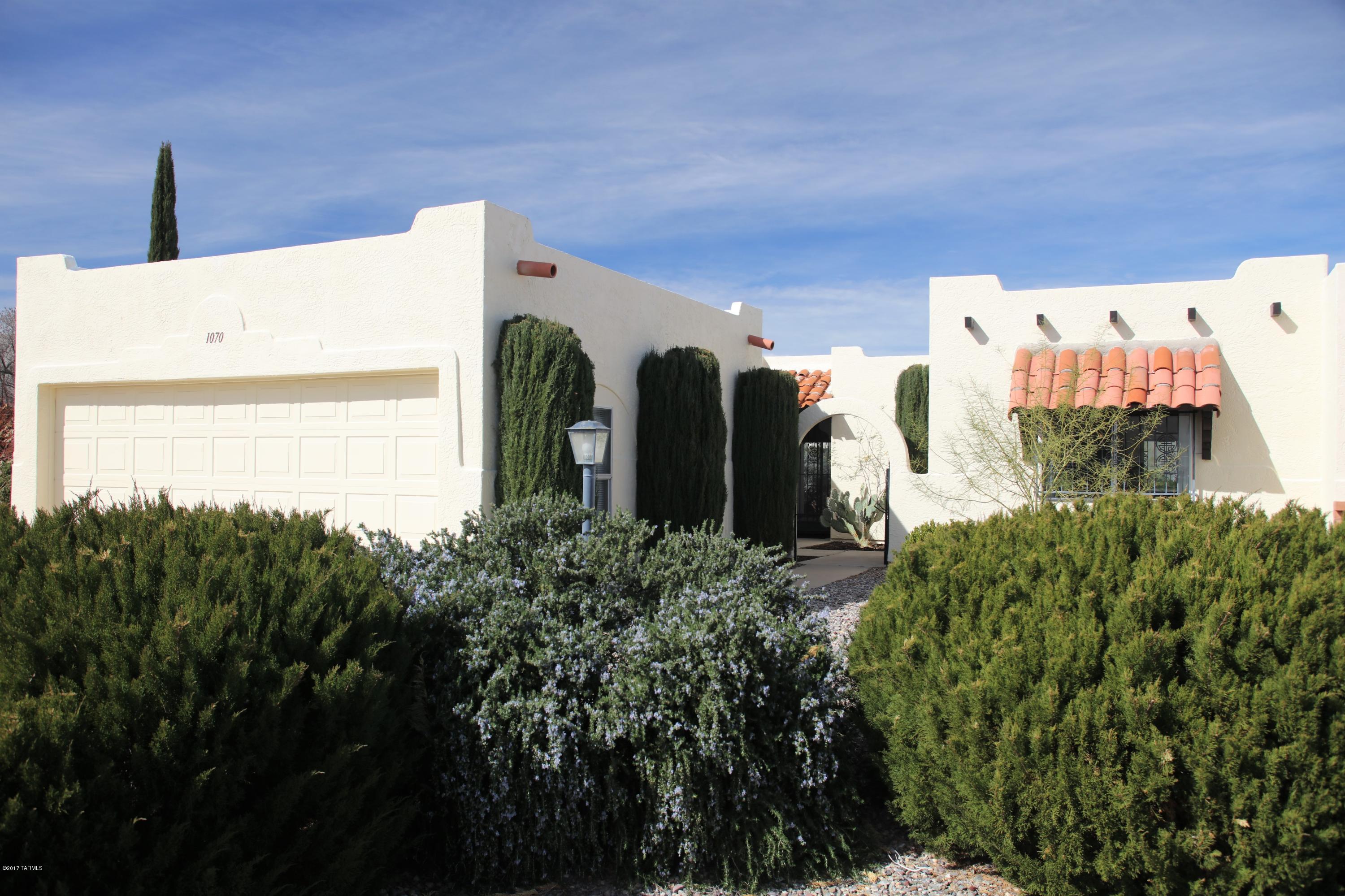 Great Secluded Location for this 2Br + Den and large 2 car garage. Many upgrades, cabinets, granite counters, etc. Tons of storage areas. Backs to arroyo with trail to GVR pool. You don't want to miss this one, priced right!