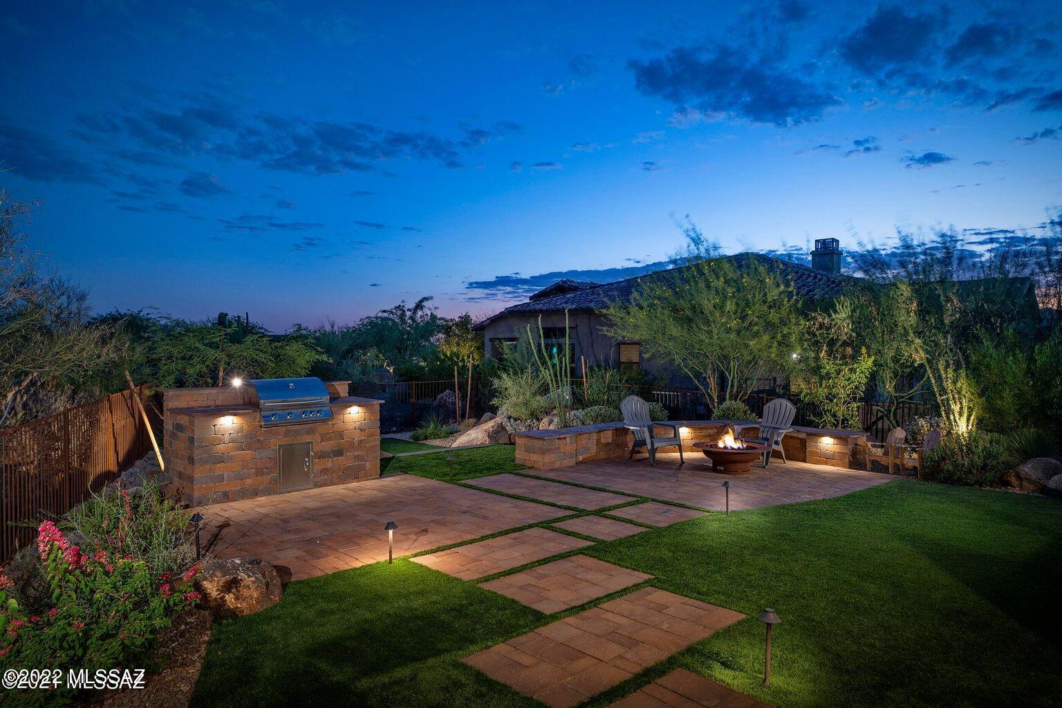 Like new, 2019 Built Home in Stone Gate within the prestigious guard gated community of Stone Canyon. Contemporary, light & bright home features a split floor plan with 3 bed + office, 3.5 baths, extra bonus room, & 4 car garage. Designer touches have been added throughout including upgraded light fixtures & fans, built-in bookshelves in living room, built in storage in mud room, custom barn doors, designer wallpaper, drapery, & so much more. 4th car garage converted to a 252 sq. ft office space with custom built-in desk, door, windows & mini-split unit to keep you cool all summer. Stunning gourmet kitchen with upscale appliances & an oversized island, perfect for entertaining! Glass sliders in the great room encompass outdoor/indoor living with a generous sized covered patio. Low Care enclosed backyard with built-in BBQ & fire pit and turf throughout. This one has it all. Luxury living at it's finest! 

Call agent for full list of amenities, and a personal tour of the home & the Stone Canyon Club: featuring world class golf & fitness facilities, dramatic clubhouse with restaurant & bar.