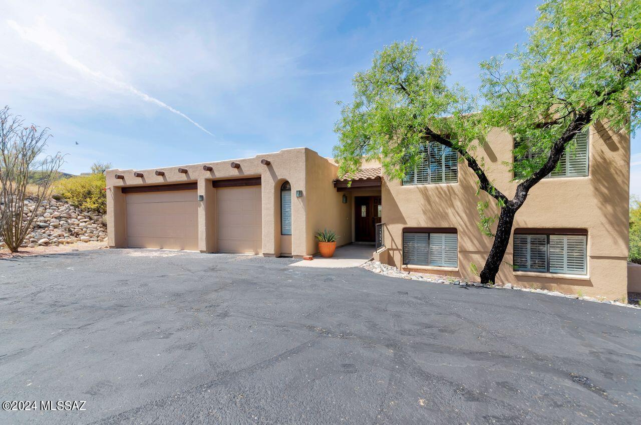 Extremely private hilltop home backed by a yard made for play.  The pool & spa overlook the city & the natural desert grounds spill down the hillside to  a quiet winding paved driveway.  Other features include a living/dining room w/beamed ceiling & wall of windows, an enormous window-decked eat-in kitchen w/skylight, a decorative oak stairway winding down to the recreation room w/a fireplace & a wet bar + 2 bdrms & up to 2 more bdrms & the expansive master suite w/doors onto its private covered balcony w/endless views. 3-car garage.  The timing is right; the home is move-in ready,
the perfect venue to party and enjoy the multiple fireworks displays throughout the valley this 4th of July with family and friends. 
Range price:  $975,000 - $1,100,000.