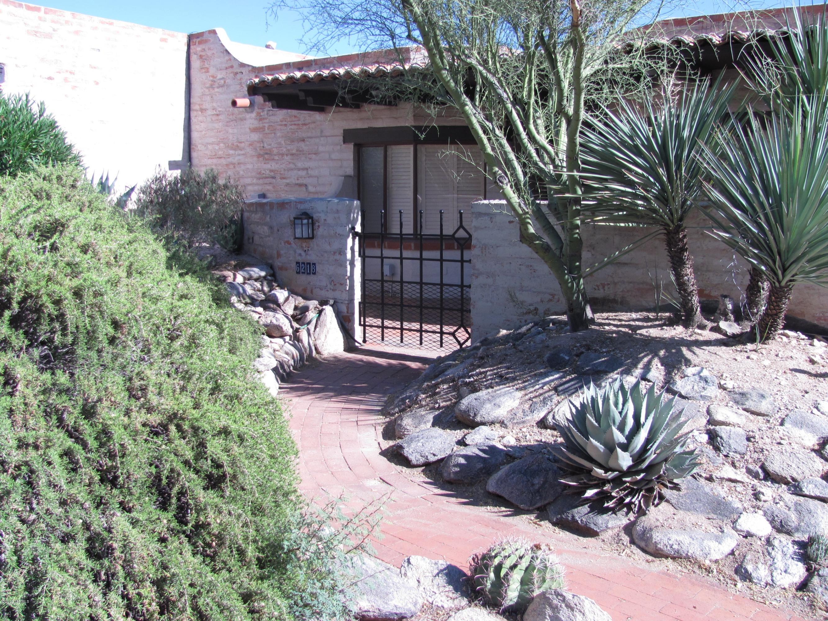 Located in secluded 14 home community nestled in the foothills. True southwestern style home with city views. Spacious front patio and covered patio off the living room. Fireplace in the huge living room with dining area. Open kitchen with tiled counter tops and a window over looking the back patio. Community pool next to the property for easy access. Water and Gas Included! ***RENTAL RATES REFLECT A $45 CONCESSION FOR TENANT'S AGREEMENT TO CHANGE HVAC FILTERS MONTHLY. RENTAL RATES ARE $45/MO HIGHER THAN STATED W/O CONCESSION.***