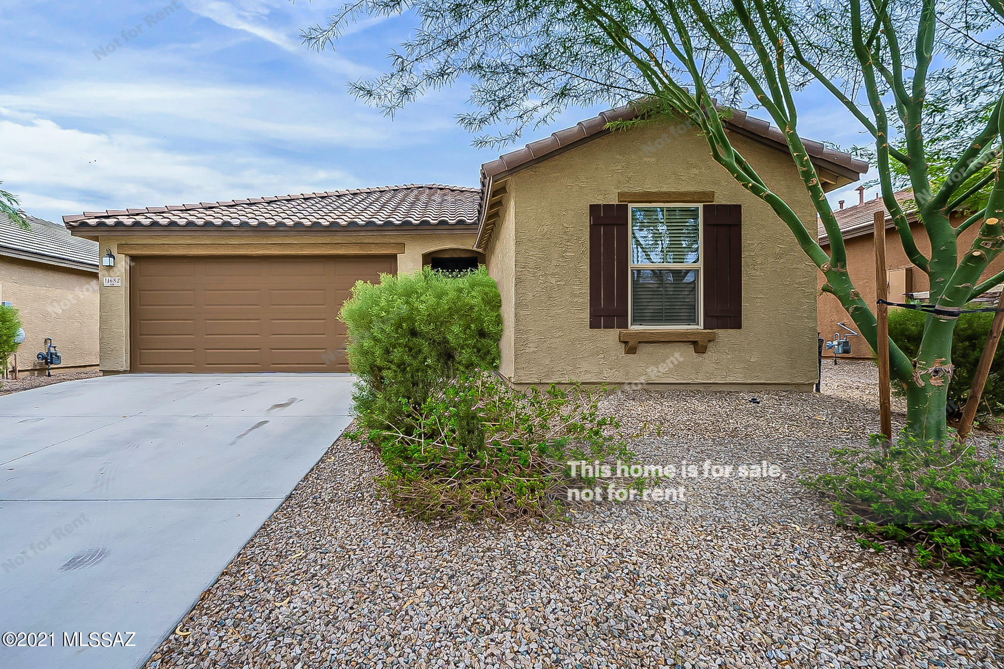 Built in 2017, this Marana one-story home offers a patio, granite countertops, and a two-car garage. This home has been virtually staged to illustrate its potential.