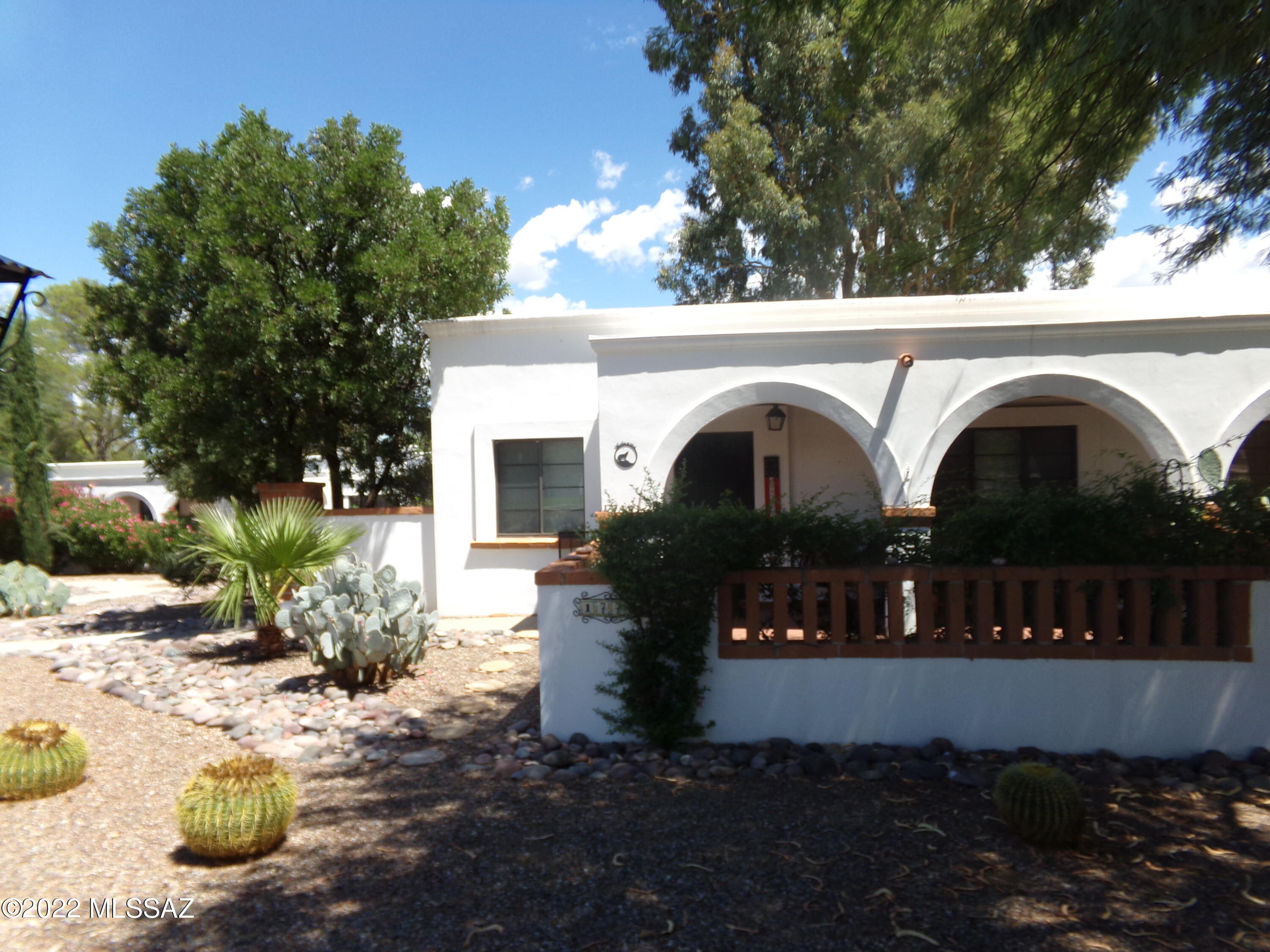 Fully Furnished with Washer/Dryer in shed on back porch with Mountain View. Setback unit across the street from the pool. Walk in Tiled shower and updated cabinets. All tile floors except bedrooms.