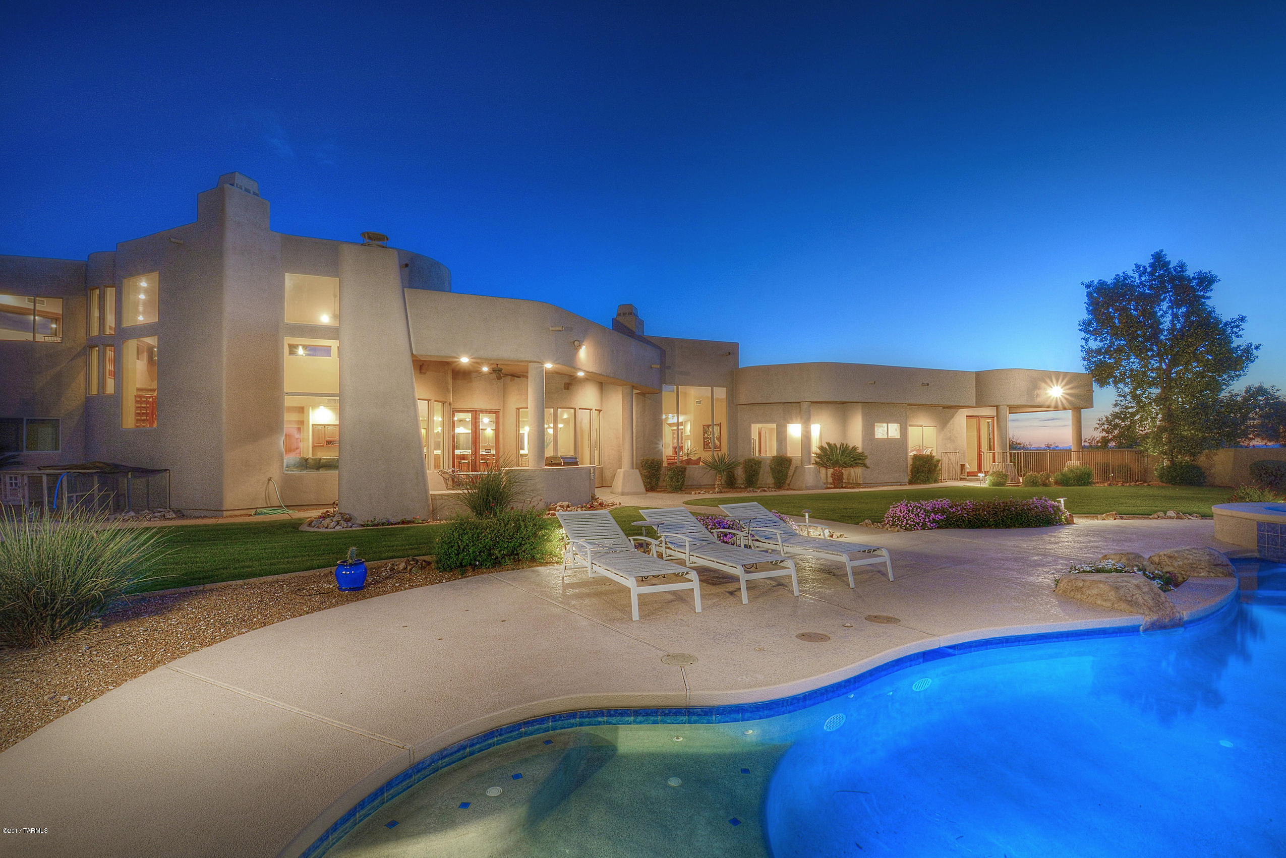 Outstanding 5 bedroom, 3 bath, 4238 sqft contemporary on 1.69 acres on arguably the highest & best city & mountain view lot in gated Green Ridge. with dramatic high ceilings, walls of windows & city or mountain views from every room, the architect designed home in this private gated community of 38 lots offers professionally landscaped front & rear yards, neutral porcelain tile or brand new carpet throughout, custom alder doors, gourmet kitchen with granite counters, cherry cabinets and stainless steel appliances. Gracious master suite features bath with custom travertine surrounds & spa tub. Three fireplaces, game room with see forever views, wet bar and 3 car garage. Expansive rear grass yard offers covered rear porch with fireplace, BBQ, solar negative edge pool and hot tub.