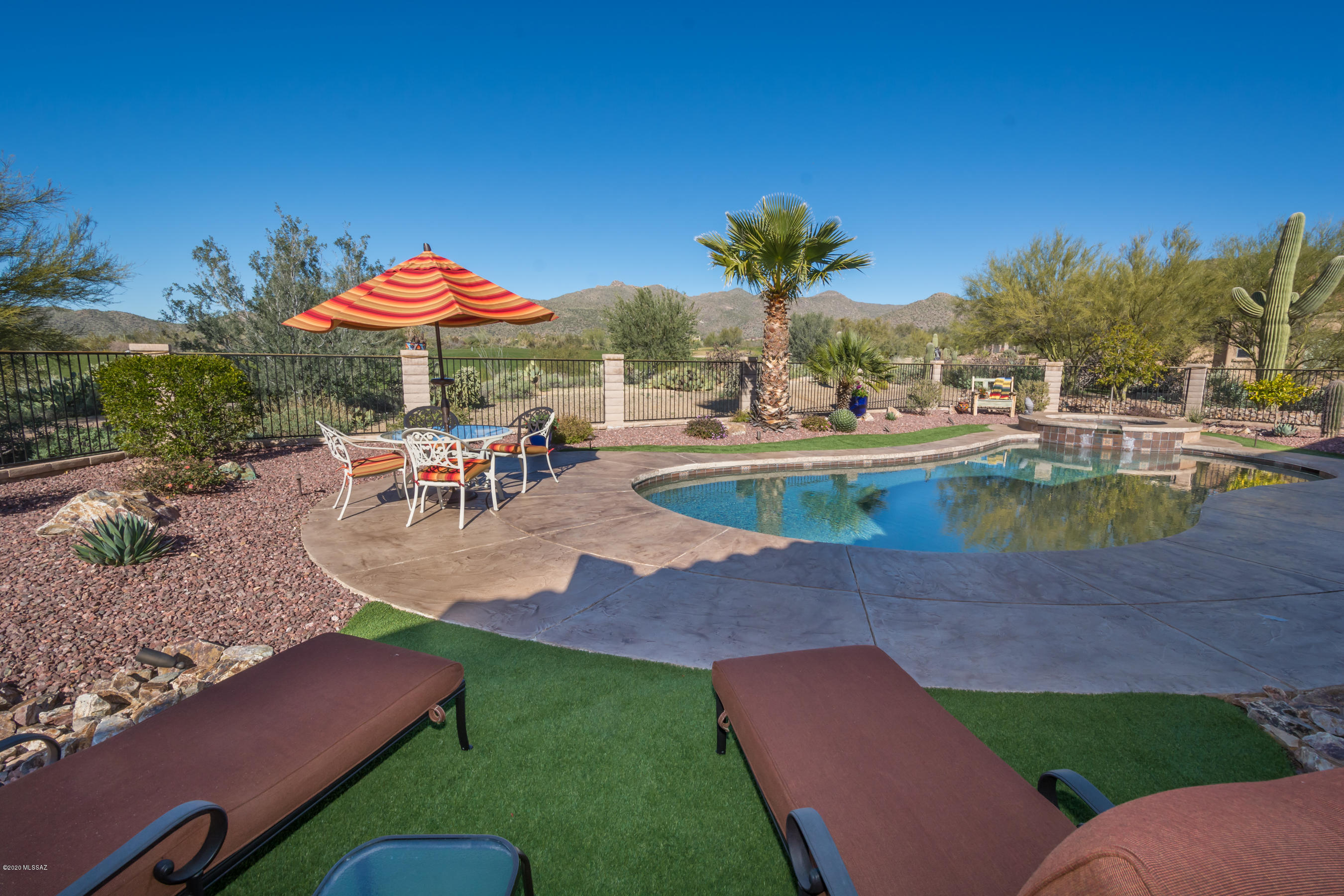 Located on the 15th Fairway-GALLERY SOUTH COURSE. Enjoy stunning Tortolita views, luxury & perfection in this entertainers delight! Spacious Greatroom w/ gas FRPL & wall of niches accented by natural stone & slate hearth. Lg dining area w/ tray ceiling & windows. Wet bar off GTRM plus cooled wine room! Kitchen w/42'' upper cabs, granite, island, blt-in double oven + micro, 5 burner elect. cooktop, breakfast bar, nook dining. Butler's pantry & walk in pantry off kit/gar. Laundry w/ sink, cabs, folding area. Master suite offers patio access, 2 closets, soak tub. BRs 2 & 3 feature en suite baths. Half bath for guests. Office/den/gameroom off GTRM. Outdoor oasis offers cozy covered patio w/ electric shades, pool, spa,BLT-in BBQ w/ bar seating. special night lighting,  3 car gar.