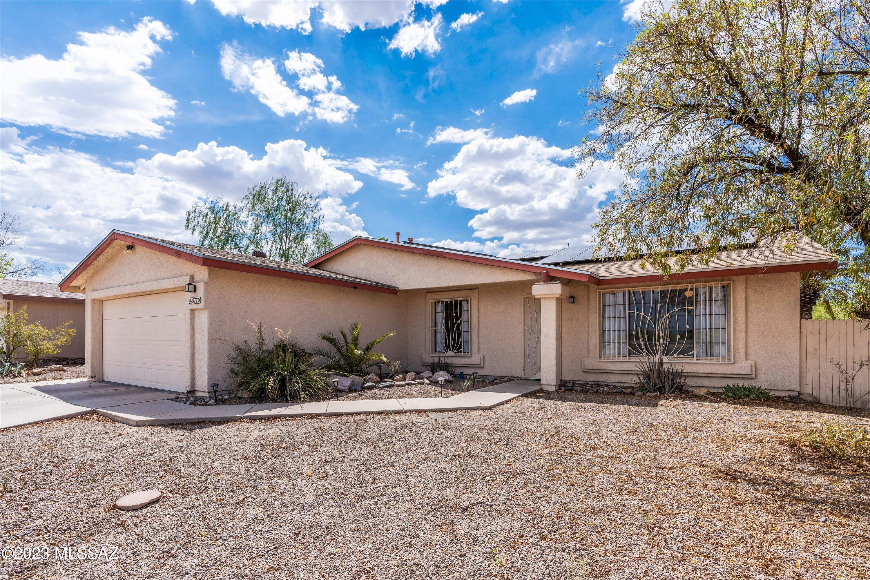 Welcome to your dream home in Midvale Park! This exceptional residence, with its own private pool, is perfectly situated just steps away from the popular Loop jogging/cycling path. With a spacious floor plan spanning over 1,600 square feet, including 3 bedrooms plus a den and 2 baths, this home feels incredibly roomy. The kitchen seamlessly connects to the family room + dining/breakfast nook and features a large island and stainless steel appliances. The backyard is an oasis with a large covered patio, grassy area, and sparkling pool, perfect for endless relaxation and entertainment. Don't miss this amazing opportunity to own in Midvale Park!
