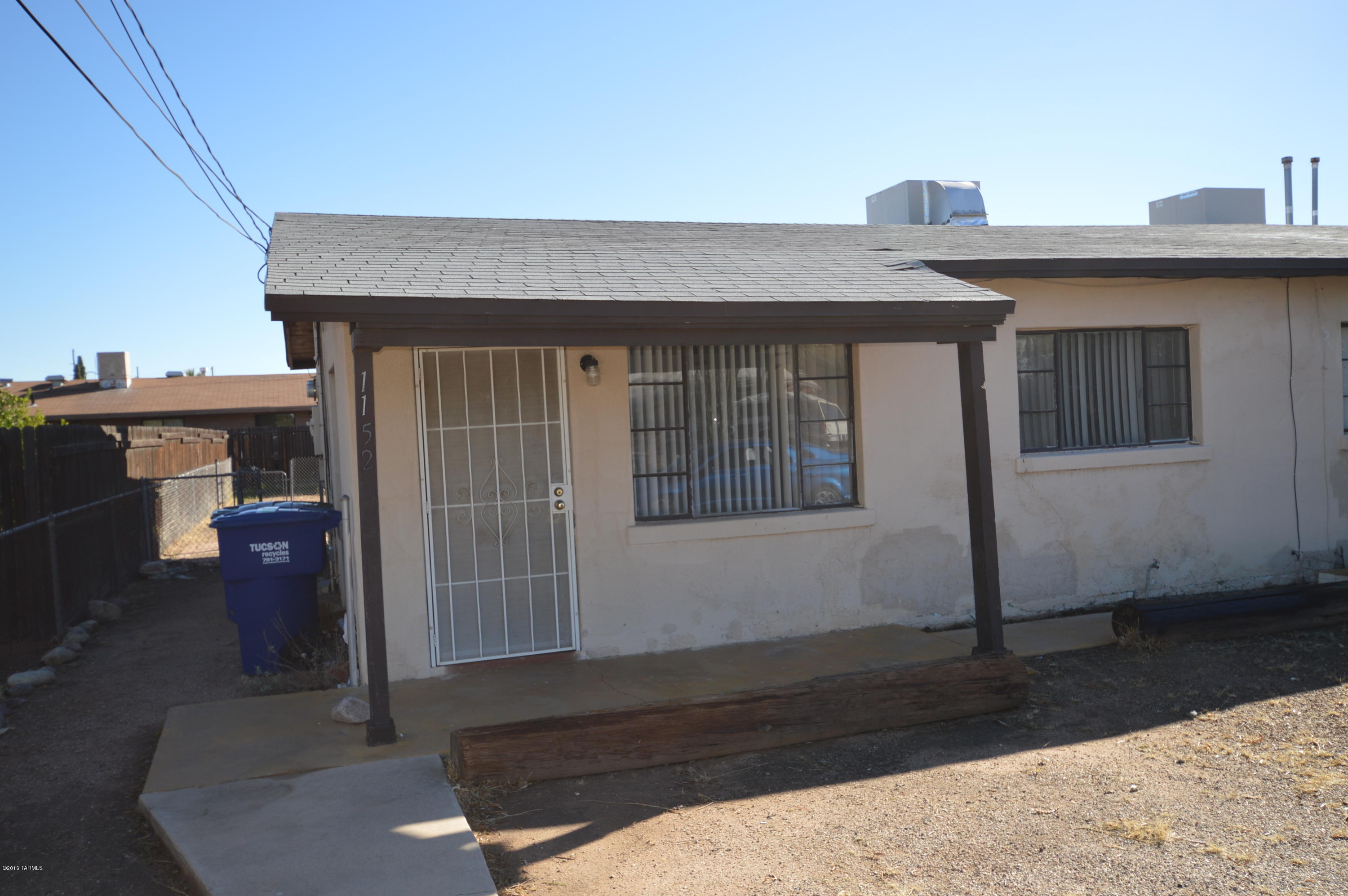 Immaculate unit, solid masonry construction. HUGE fenced yard with covered patio. Large bedrooms. Big open kitchen with dining area. Central gas heat and hot water. Separate laundry room. Economical, affordable and close to everything, just off Speedway at Rosemont. Dont let this one get by...CALL NOW!!