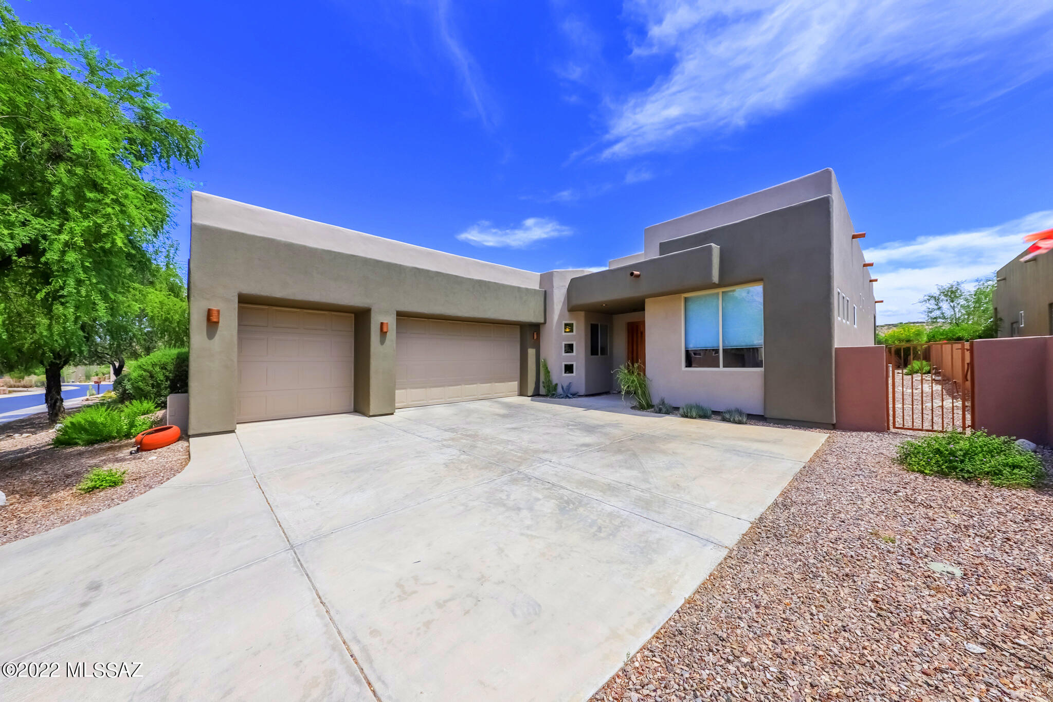 FABULOUS MARC SOLOWAY DESIGNED CONTEMPORARY HOME IN SMALL GATED COMMUNITY. SOLAR PANELS FOR LOW MONTHLY COST AND ARE PAID FOR ALSO PEBBLE TEC POOL WITH SPA HAS INDIVIDUAL SOLAR TUBING FOR EXTENDED USE APR.-OCT. 4 BEDROOM 3 BATHS LARGE OPEN FLOOR PLAN WITH HIGH CEILINGS, LARGE PRIMARY BEDROOM W/FIREPLACE. SEE THROUGH FIREPLACE BETWEEN FAMILY ROOM OR YOU CHOOSE DINING/OFFICE/DEN. STAINLESS STEEL APPLIANCES IN KITCHEN WITH GRANITE COUNTERS, UNDERMOUNT SINK,UPGRADED CABINETS THAT OPENS TO EATING AREA AND FAMILY ROOM. GREAT HOME FOR ENTERTAINING WITH BUILT-IN BBQ, BEAUTIFUL CITY AND MOUNTAIN VIEWS. 3 CAR FINISHED GARAGE. MANY OTHER AMENITIES THIS IS A MUST SEE!