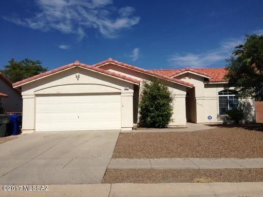 Great, spacious 3 bedrooms plus bonus room ( could be 4th bedroom) and 2 baths.  Features al tile great room, corner lot with sparkling pool and grass area.
