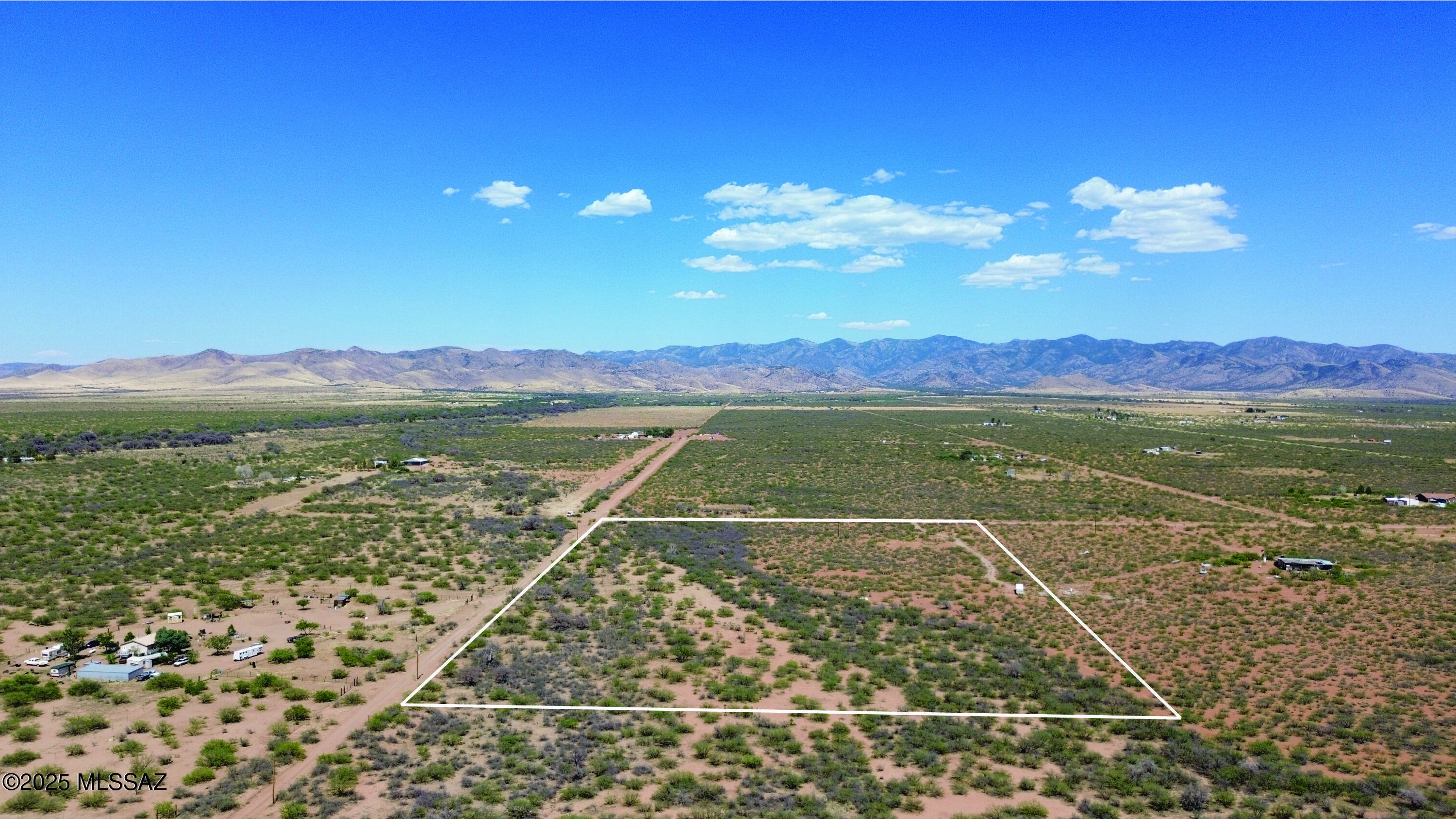 Discover peace and wide-open space on this stunning 20-acre RU-4 zoned parcel. Located on a corner lot with power and fiber optic internet available at the lot line, this property offers both convenience and seclusion. Enjoy panoramic mountain views right from your doorstep, with the majestic Chiricahua Mountains just a short drive away—perfect for hiking, hunting, exploring, or simply unwinding in nature. Less than 1/2 mile from pavement.
