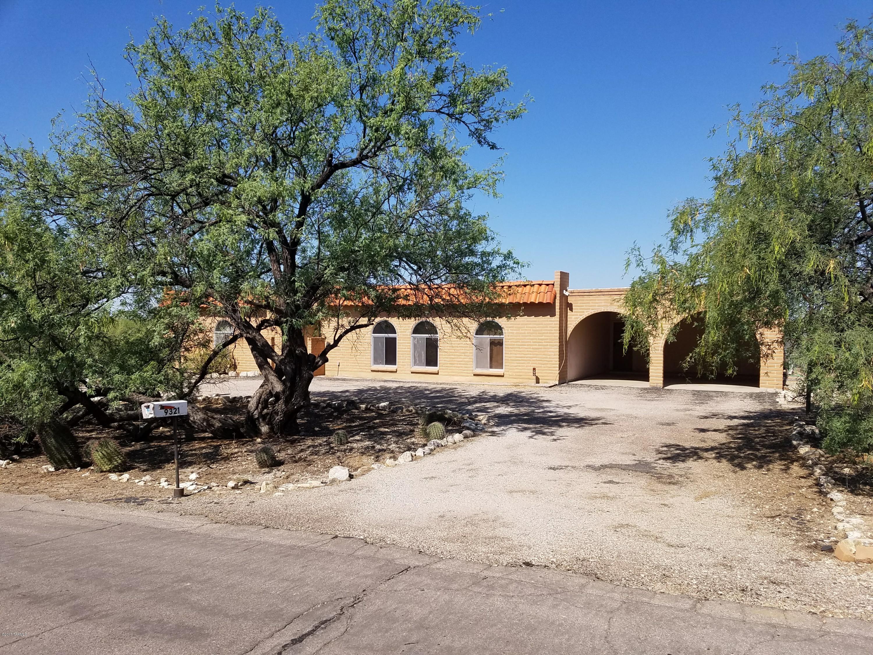 Rare find for this vintage style home, nestled in the eastern Catalina Foothills. Bright, spacious floorplan with sunken living room and separate family room with fireplace. 4 bedroom, 2 1/2 bathrooms, with breakfast nook and all appliances including double ovens. This is a great location, with walking distance to Sabino High School.  Amazing mountain views from the backyard-perfect for entertaining.