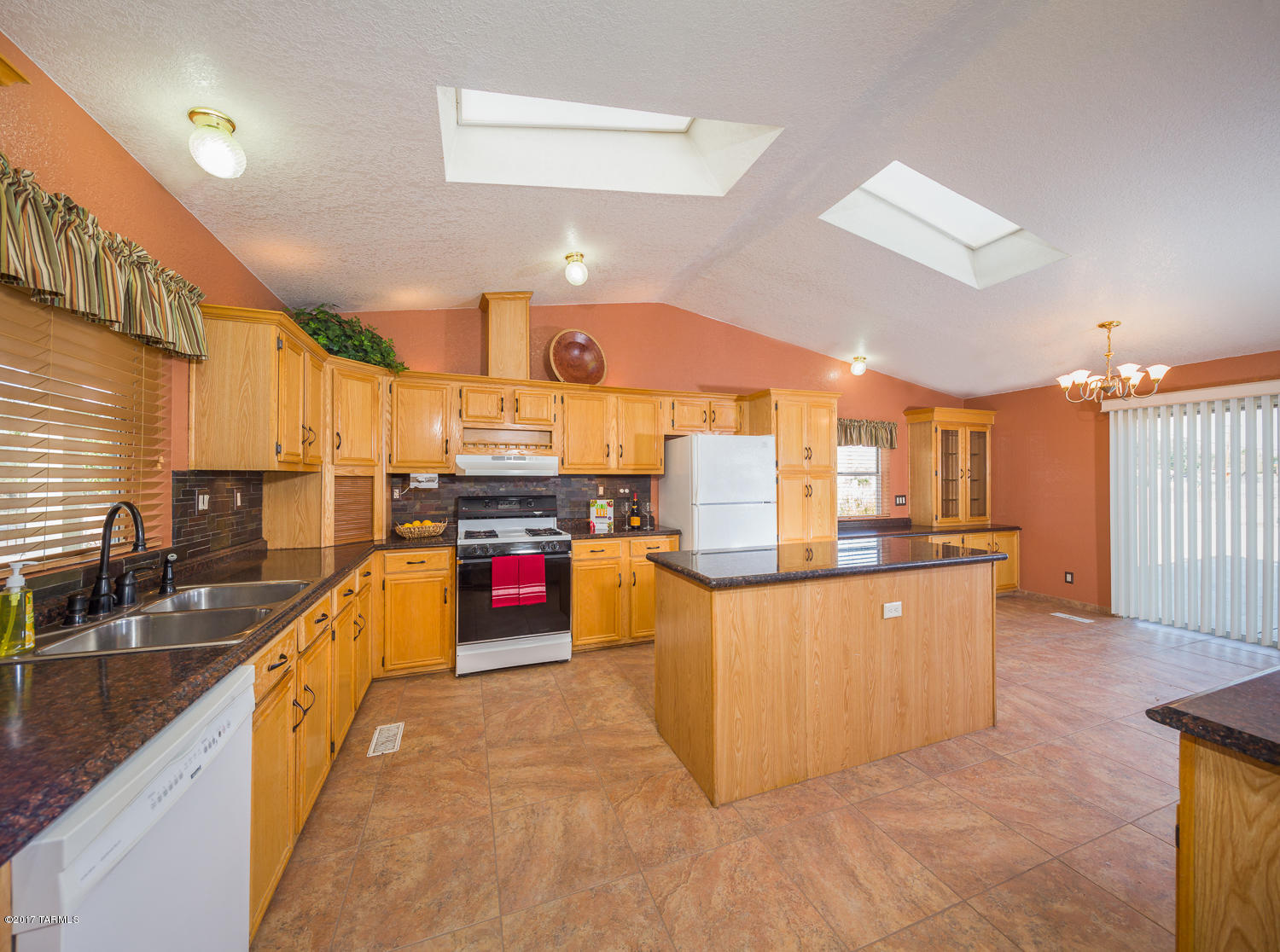 This beautiful NW home just hit the MKT and is READY for you to MOVE Right In! Listed BELOW Zestimate!!! Conveniently located near River and La Canada on a HUGE .47 ACRE lot!!!! Bright and Open Floor Plan offers 2180 sq ft of comfortable living space with 3 SPACIOUS Bedrooms/ 2 FULL Baths.
Whether you are cooking for 2 or 20 this REMARKABLE Kitchen can accommodate it all! Living Rm is PERFECT for entertaining or snuggling up next to the gas fireplace. Lg MASTER is equipped w/HUGE MASTER CLOSET. Dbl vanity & RELAXING hot tub! Enjoy the comfort and peace of mind knowing there have been several recent UPDATES: AC/ Heat, ROOF, Fresh Exterior and Interior Paint,(full list downloaded under doc tab)Near I-10, Shopping, Schools, and the River Walk!  On .47 acre this home has endless OPPORTUNITIES