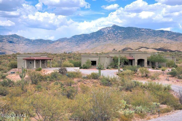 Sensational is not good enough to describe this house. Heaven is
more appropriate! 360 degree views. Equestrian property! Borders
state land on 3 sides. 3868 sf situated on approximately 3.45 acres 3 master suites (FP in master) Fabulous updated kitchen.
Media room with wet bar, formal dining room, Cantera stone fireplace in Great Room
Views from every room. Oversized laundry room with extra counter tops.
Detached guest house approx. 650 sf.  Pool /spa and outdoor shower. outdoor kitchen with pizza oven.  Recreation Center, Equestrian Center 25 minutes to all major employers.