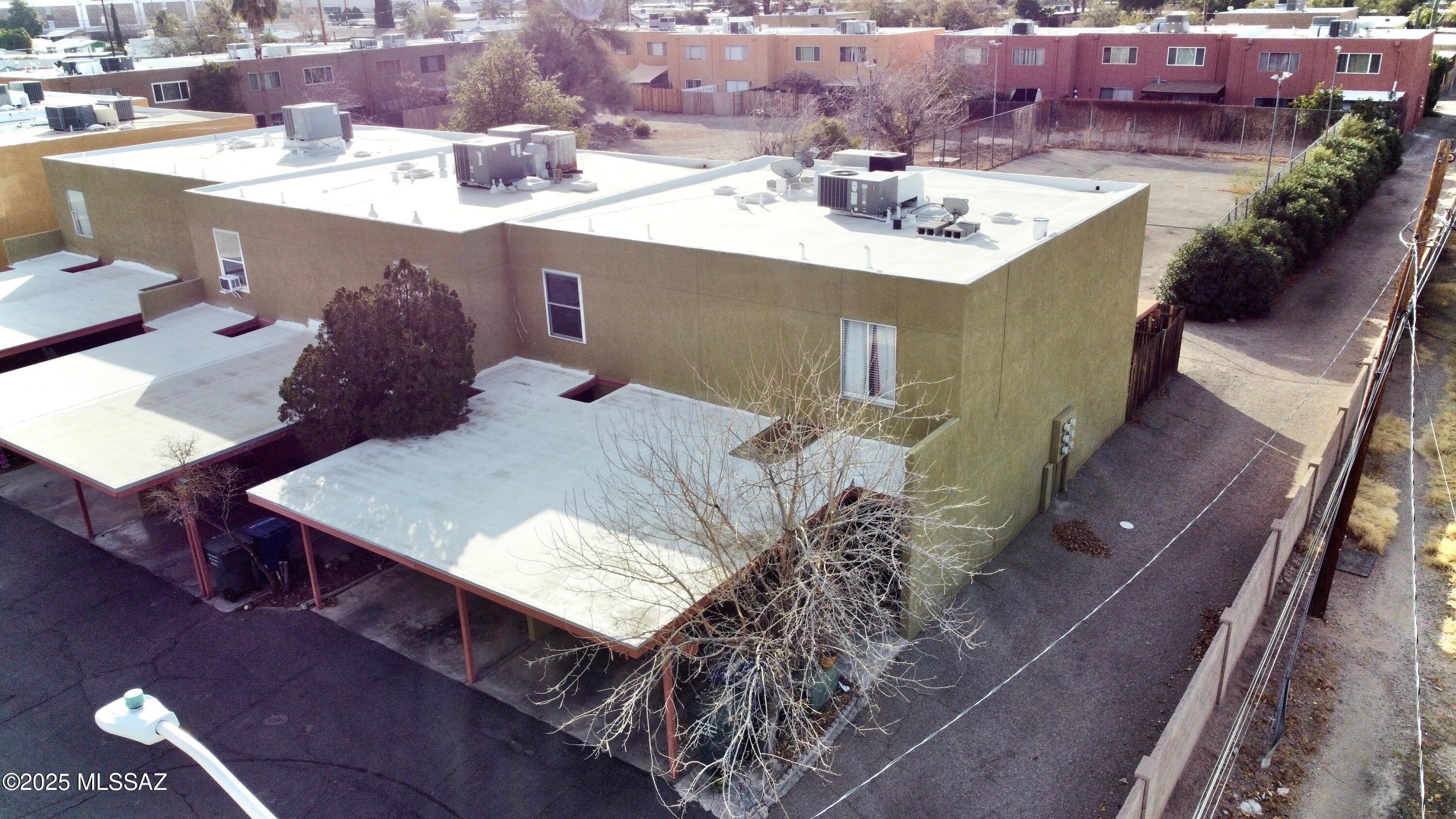 This updated townhome in a central location is bright, inviting, and move-in ready.  The unit includes all appliances, covered parking, and access to a community pool and spa.  Downstairs, you'll find an upgraded kitchen with ample cabinet and counter space, tile flooring, a spacious living and dining area, plus a large walk-in closet under the stairs for extra storage.  A half bath and sliding door lead to a private backyard with a covered porch.  Upstairs features two generously sized bedrooms and a full bathroom.  Conveniently located near shopping, public transportation, and a variety of restaurants.